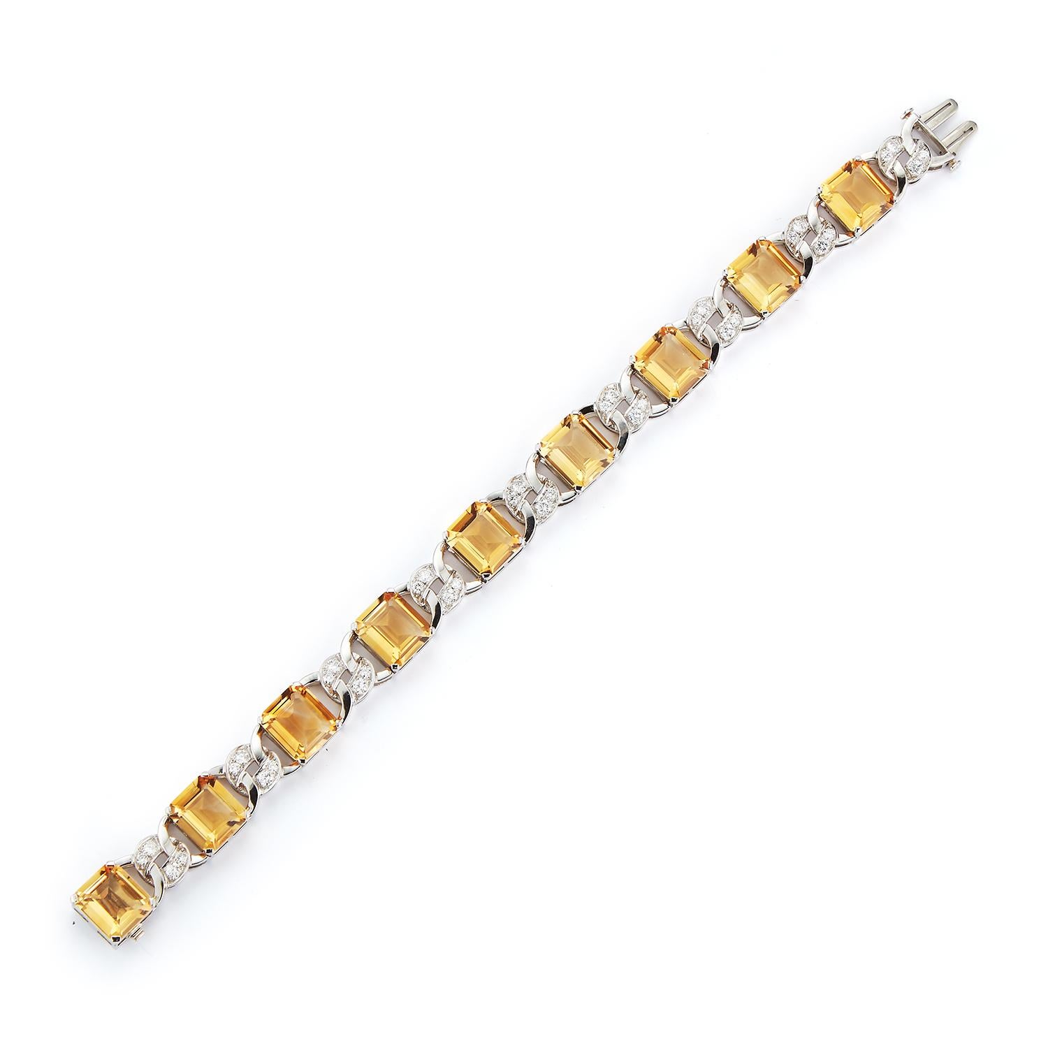 Art-Deco-Armband mit Citrin und Diamanten von JE Caldwell 

9 Zitrine im Smaragdschliff 
Abmessungen: 7