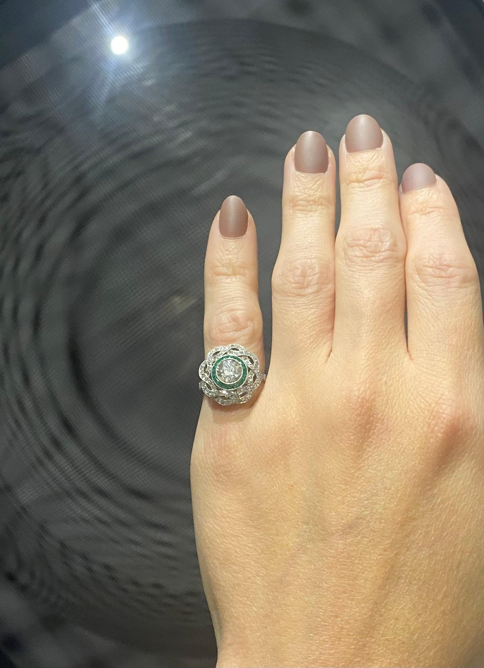 An art deco revival ring in platinum.

Beautiful ring carefully crafted with art deco patterns in solid platinum .900/.999 and embellished with a great selection of natural earth mined gemstones. All settings are finished with millegrain