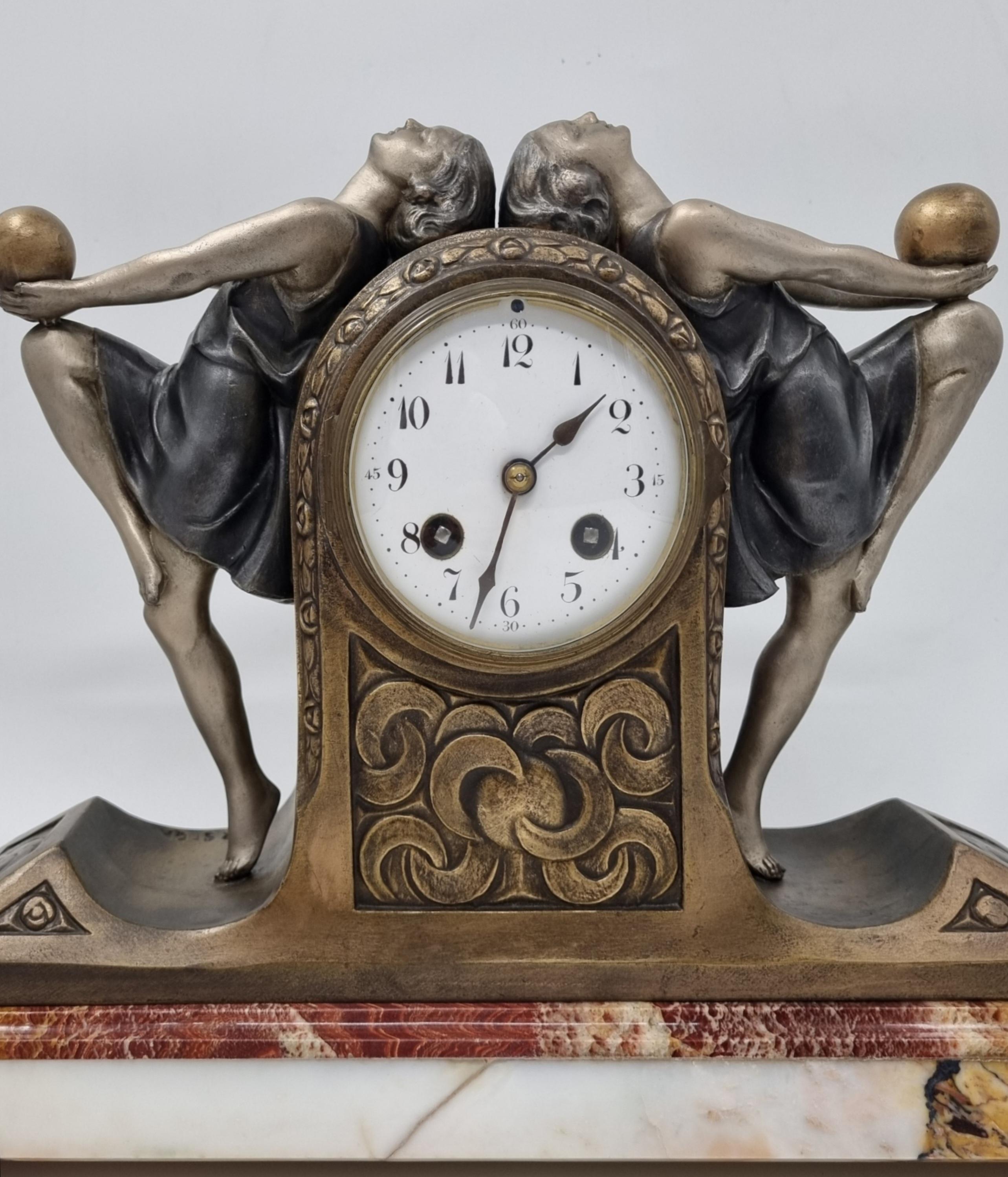 French Art Deco Clock Garniture Set with Two Ball Dancers by P. Sega For Sale