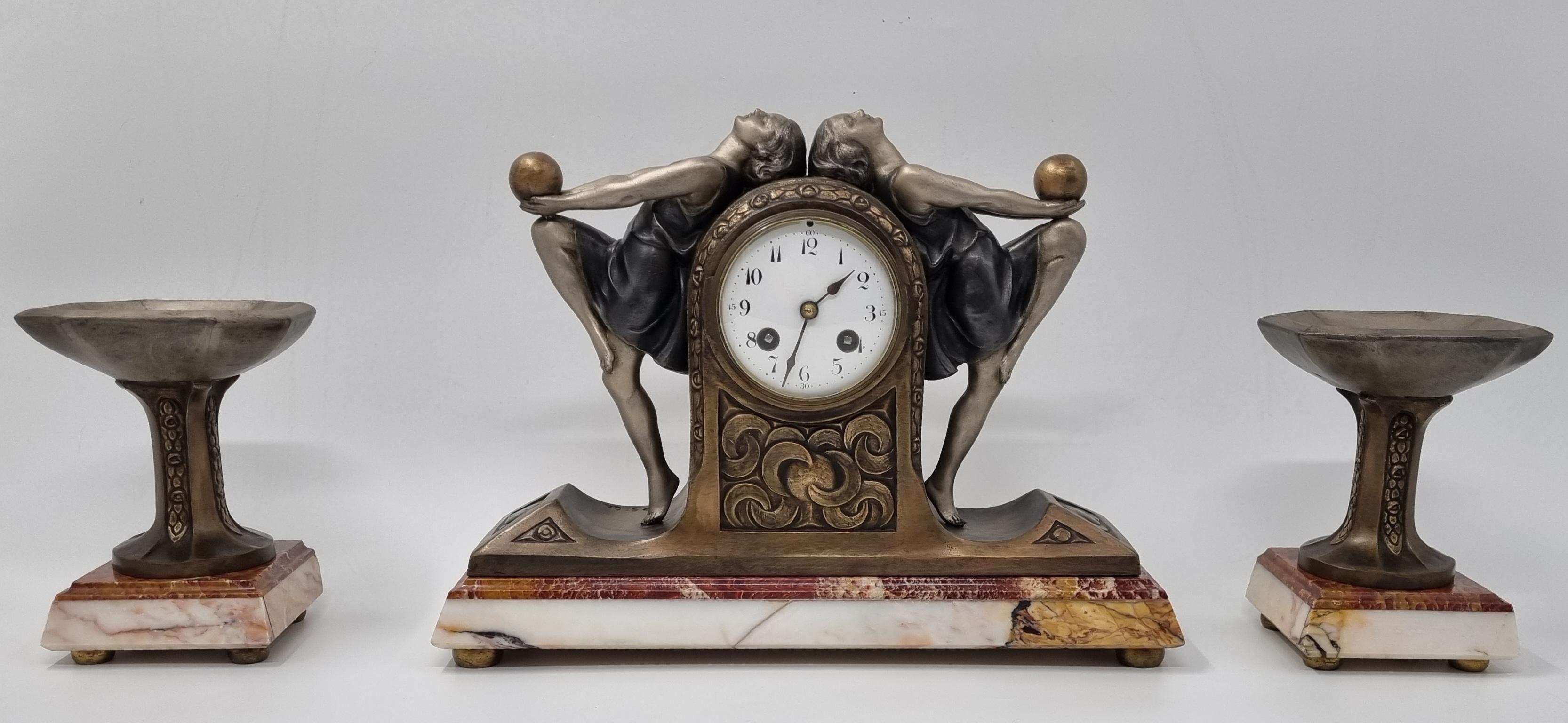 Early 20th Century Art Deco Clock Garniture Set with Two Ball Dancers by P. Sega For Sale