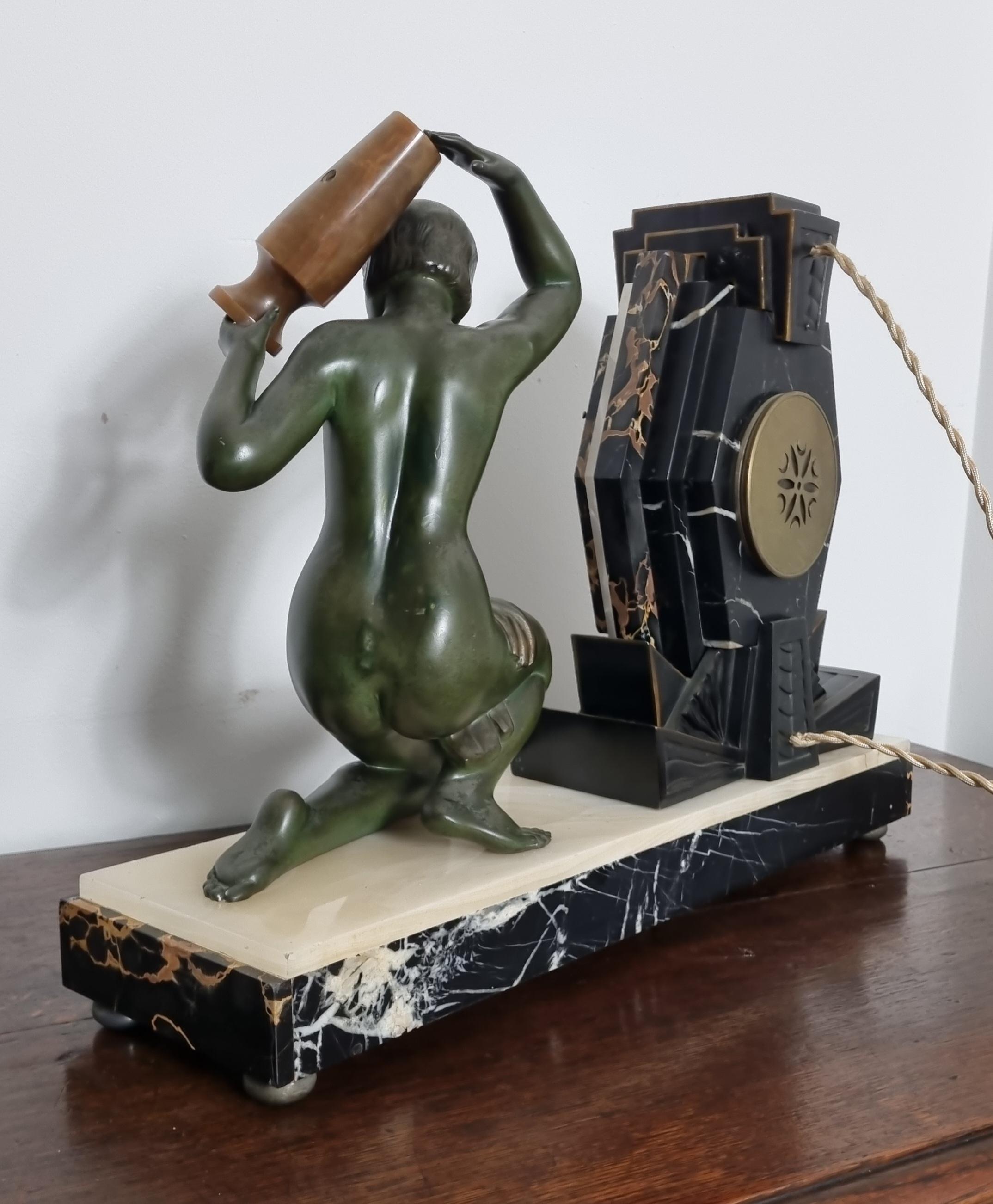Art Deco Clock with Lamp - Water Carrier Sculpture / Illuminated Nude with Vase For Sale 6