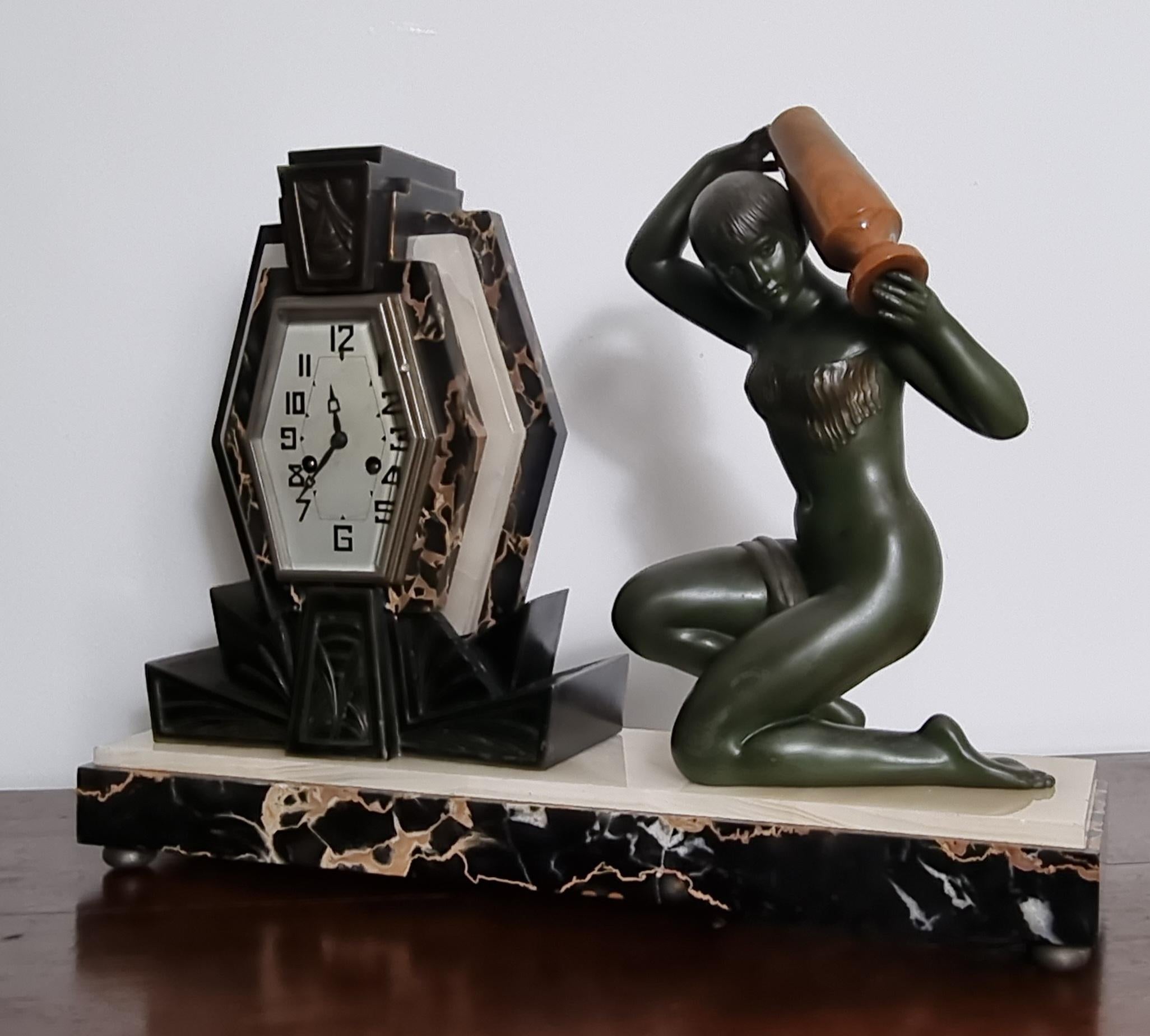 Cast Art Deco Clock with Lamp - Water Carrier Sculpture / Illuminated Nude with Vase For Sale