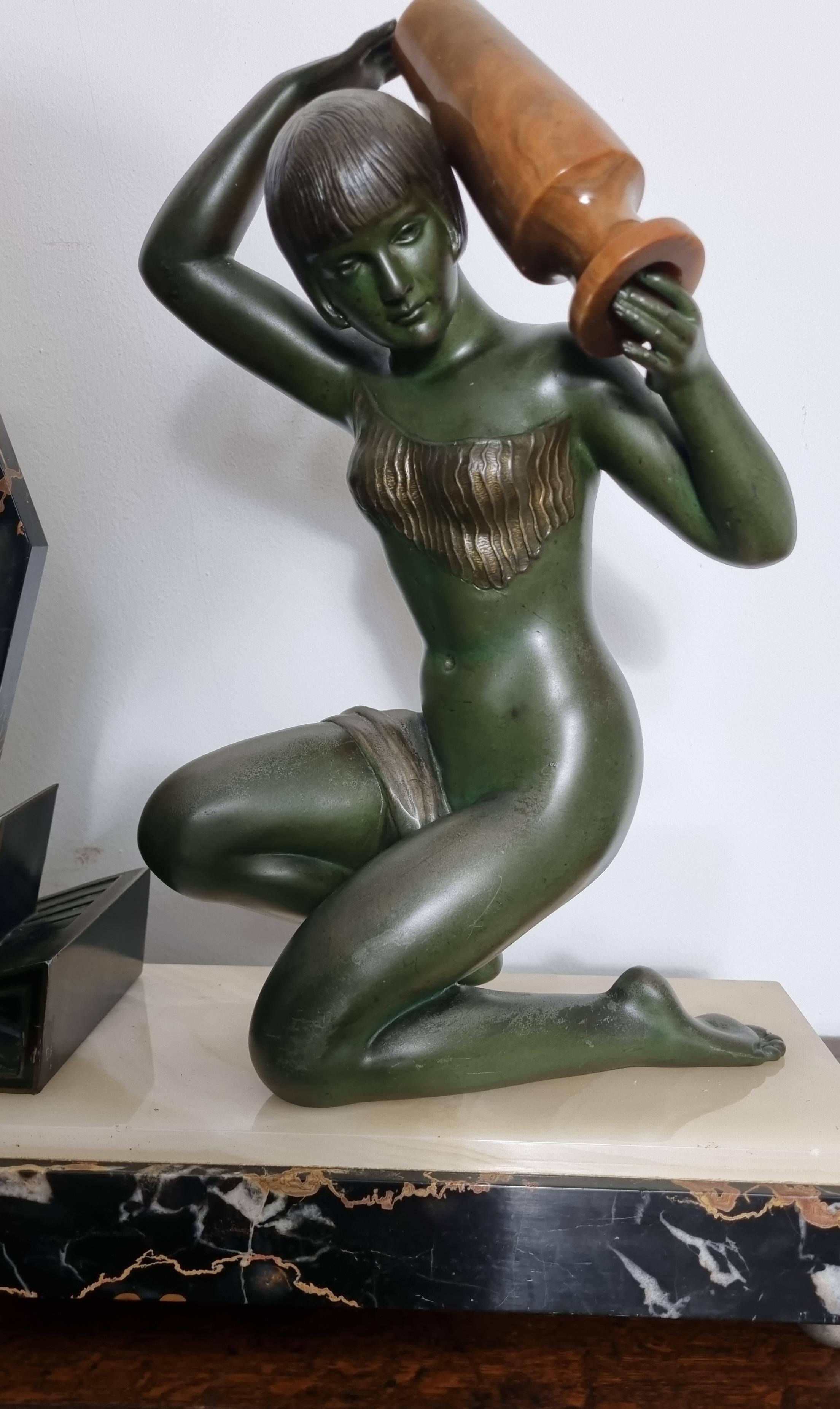 Art Deco Clock with Lamp - Water Carrier Sculpture / Illuminated Nude with Vase For Sale 1