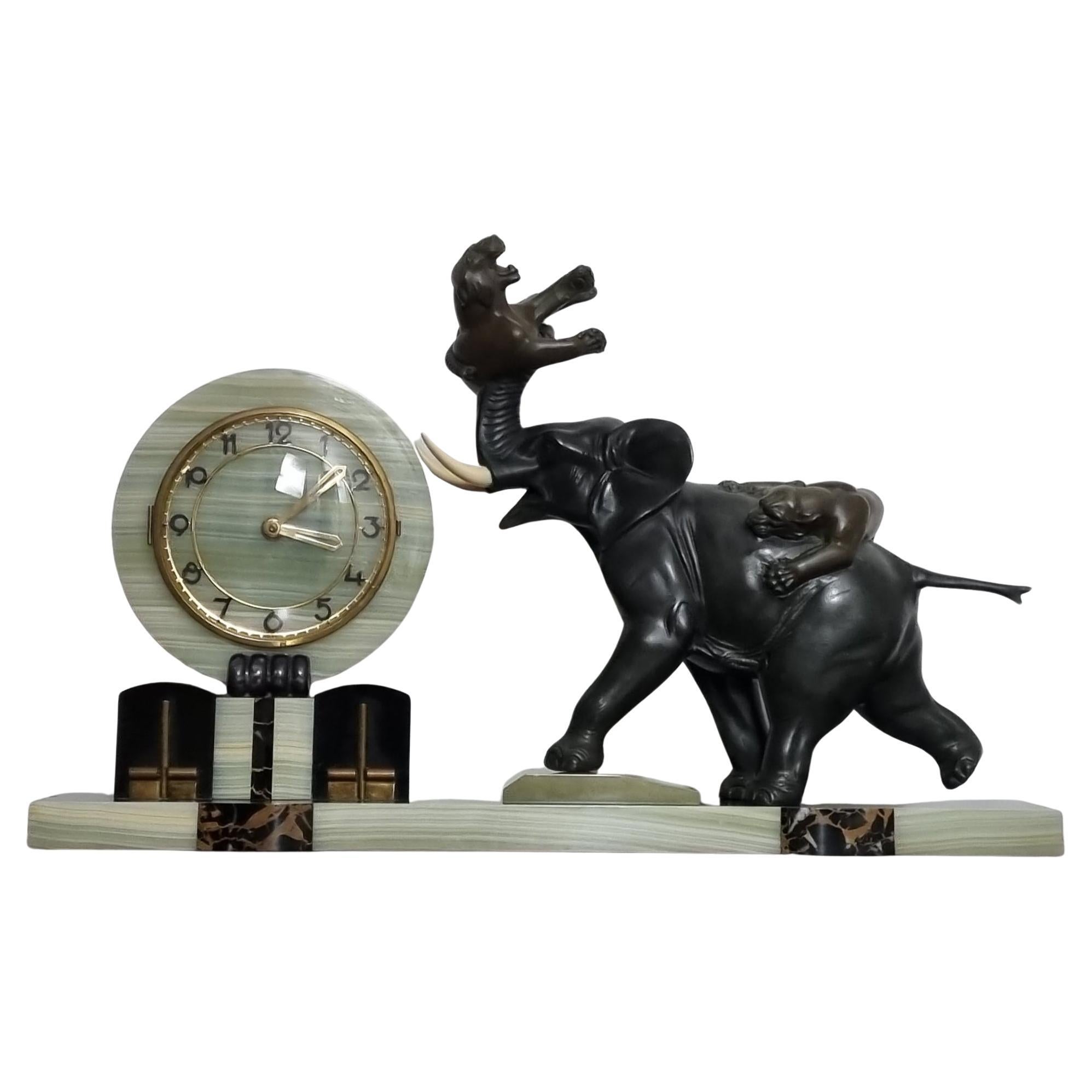 Horloge Art déco avec éléphants et tigres/panthères par Irenee Rochard