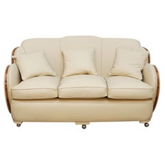Art Deco Cloud Sofa Re-Upholstered in Cream Leather with Walnut Banding