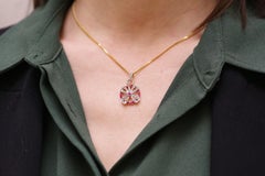 Art Deco clover ruby pendant in platinum and gold, lucky clover