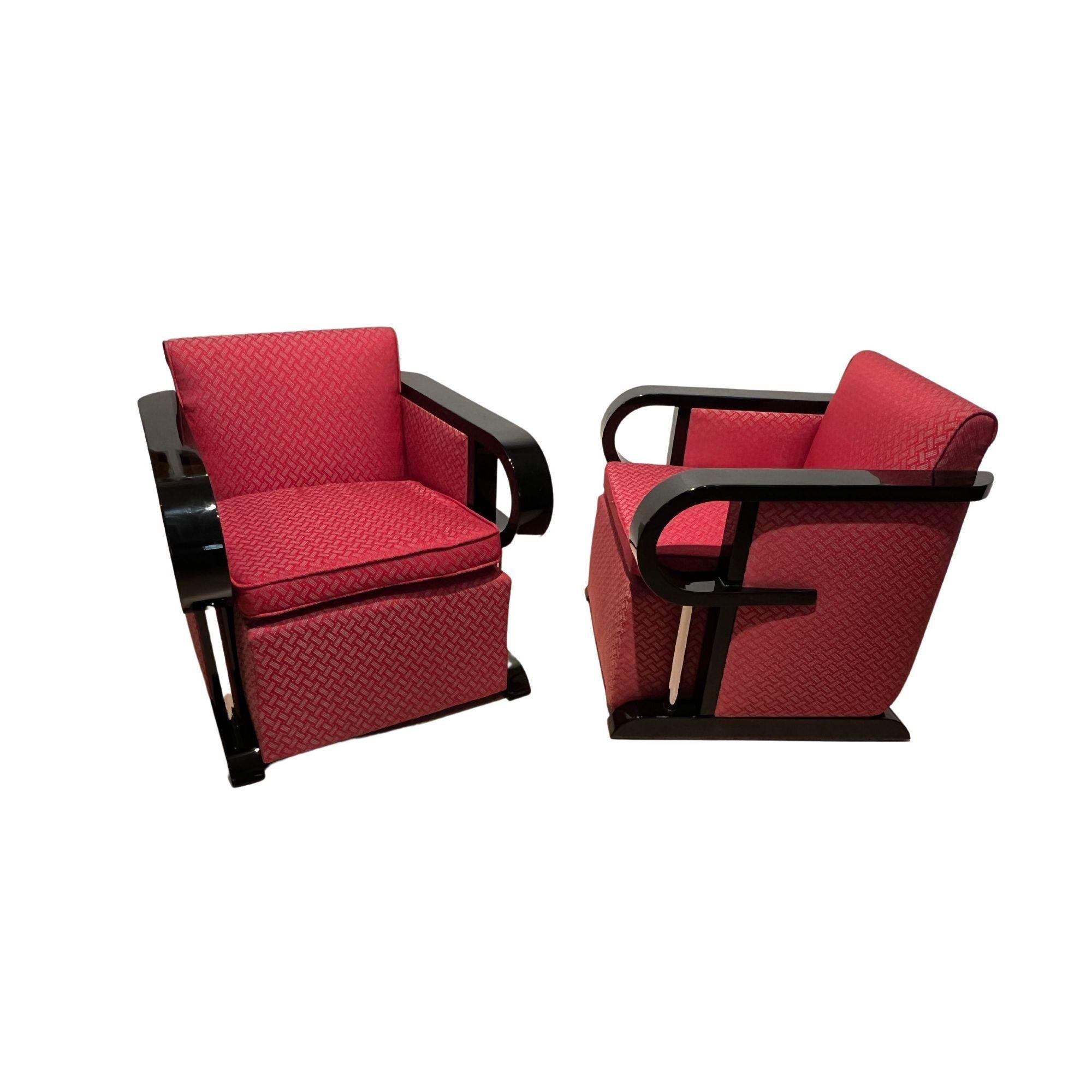 Very beautiful and rare pair of original art deco club armchairs from France about 1930.
 
Solid beech, black high gloss lacquer in several layers. Armrests elegantly curved to the front, resting on chromed metal rods.
 
Red upholstery fabric on