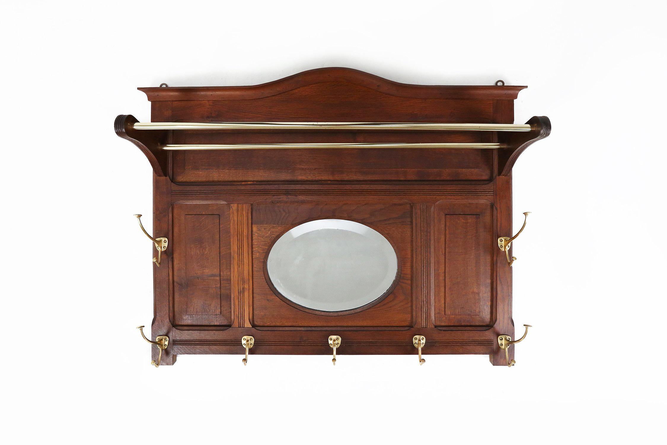 Austria / 1916 / coat rack / wood, copper / Art Deco

Sophisticated Art Deco wall mounted coat rack designed by Adolf Loos in 1916 for the Viennese Cafe Capua. Hand crafted off solid wood and copper in Austria in 1916. 

This coat rack with  a solid