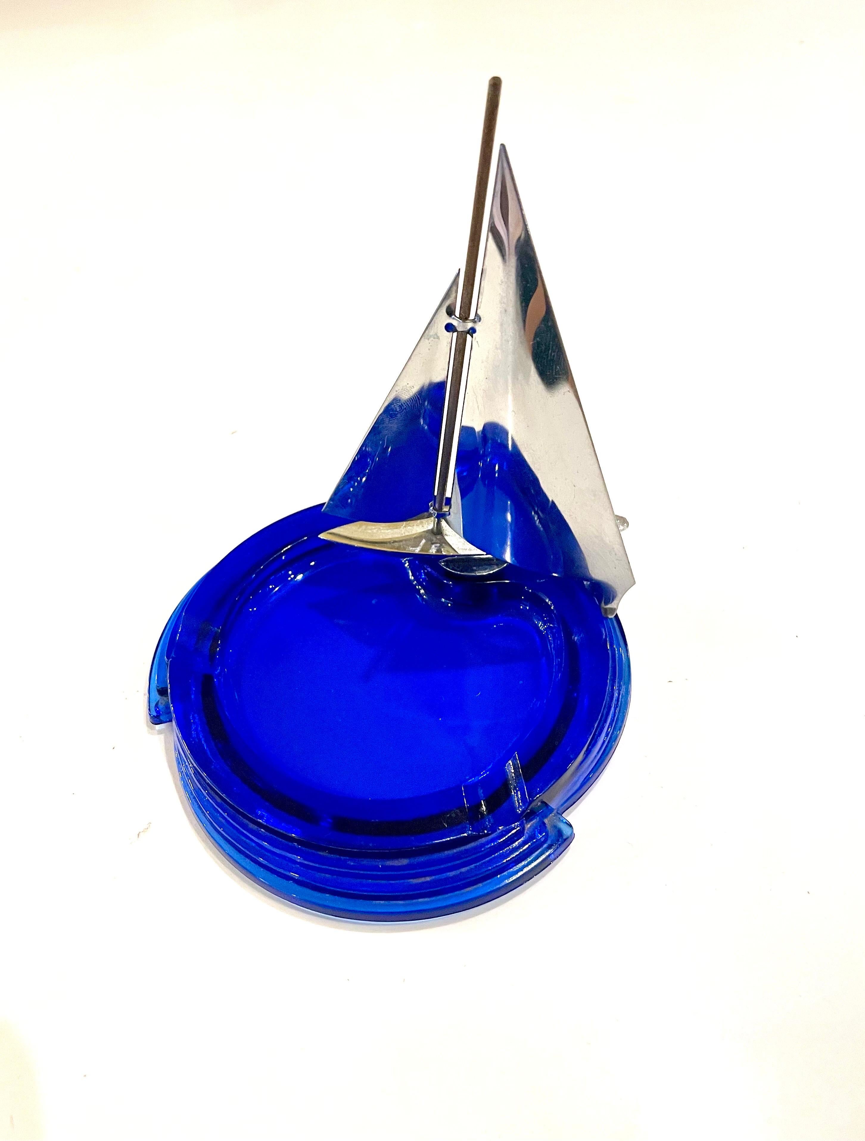 Rare Art Deco blue cobalt press glass ashtray with chromed steel decorative sailboat, great condition like new co chips cracks or rust.