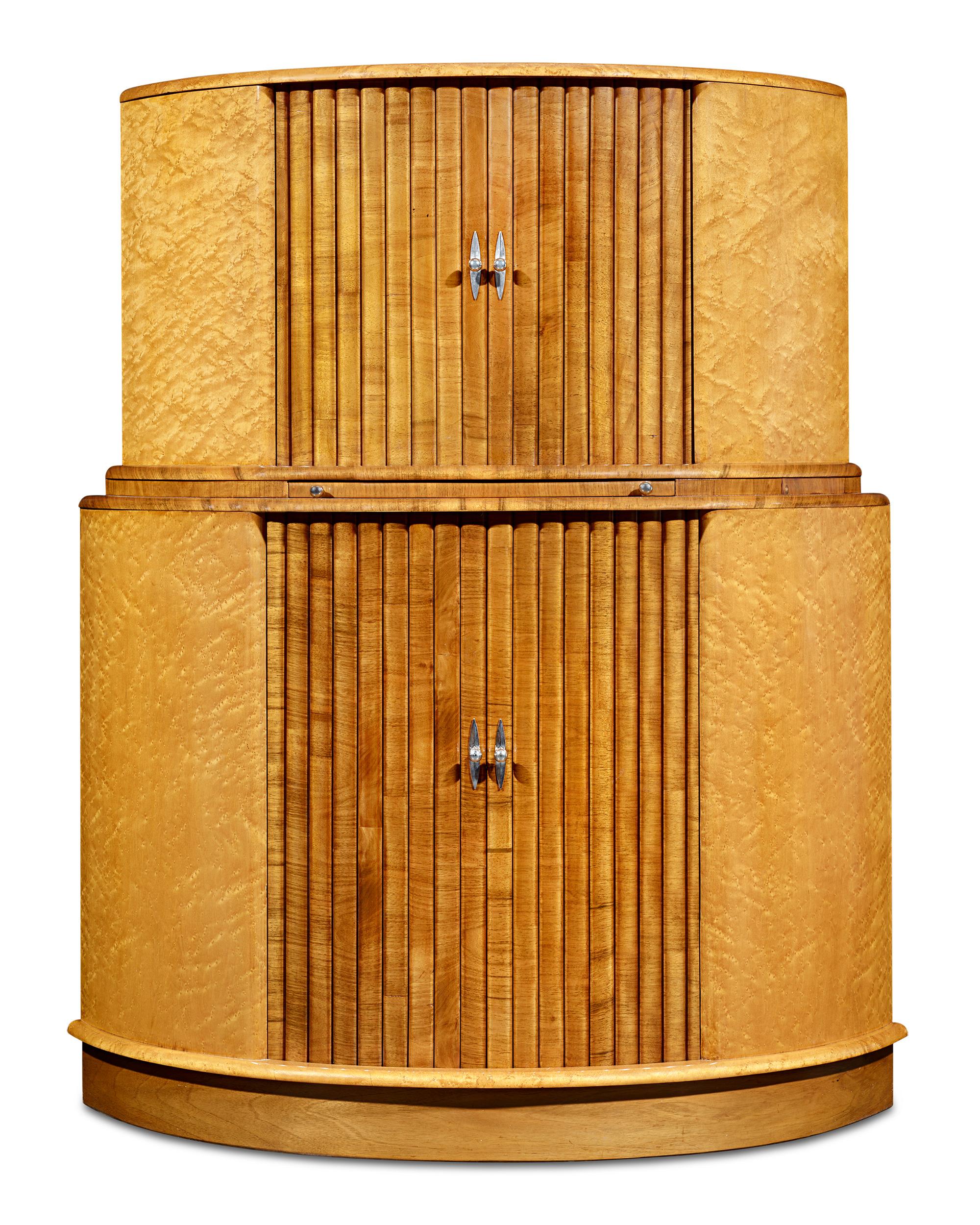 Art Deco Cocktail Cabinet
Circa 1920-1930

This extraordinary Art Deco cocktail cabinet exemplifies the sophistication and functionality of early 20th-century design. Crafted in Britain circa 1920-30, it features an exterior of walnut and birdseye