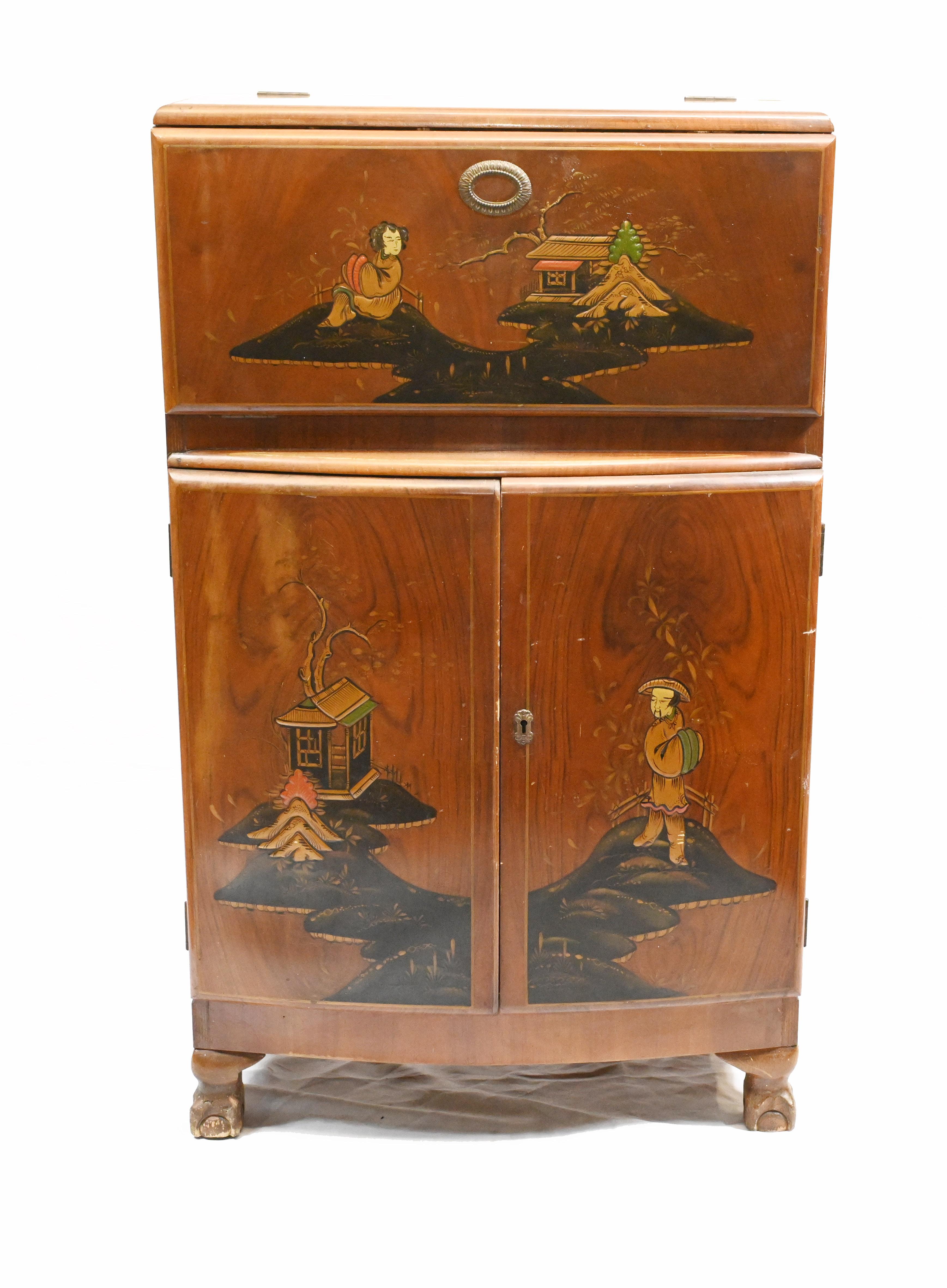 Elegant art deco cocktail cabinet decorate with intricate Chinoiserie
Classic Roaring Twenties piece we date to circa 1920
Offered in great shape ready for home use right away
We ship to every corner of the planet.