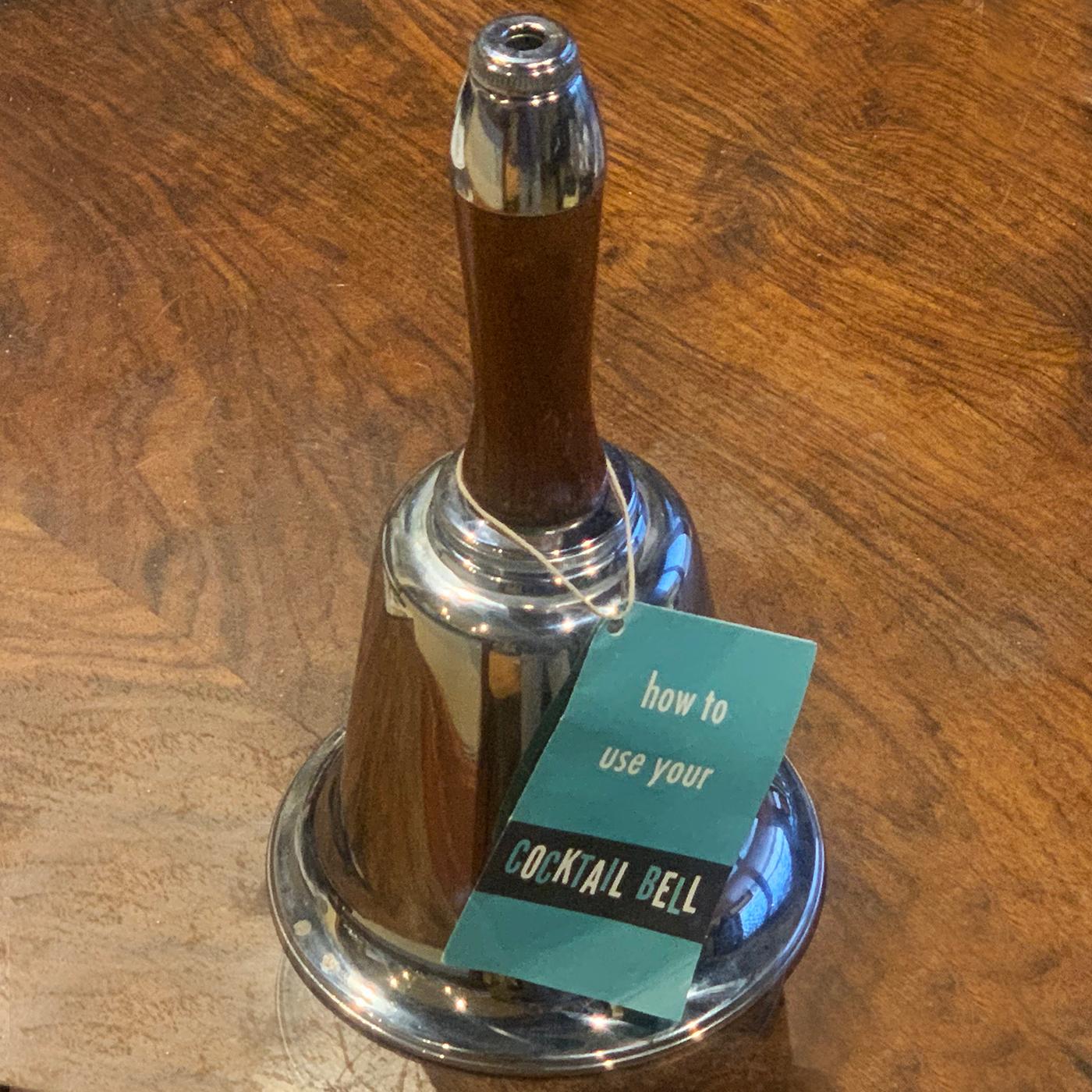 Art Deco bell cocktail shaker as new with tag and original internal dong suspended from internal strainer. These in such perfect condition are unheard of. The suspended “Dong/Bell knocker” is usually well gone from the strainer that collects the