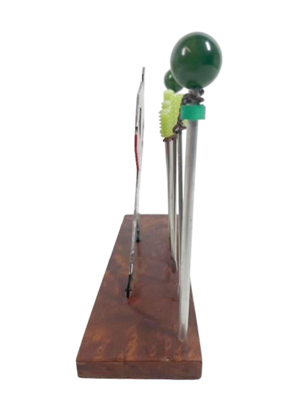 Chrome Art Deco Cocktail Pick Set with a Singer Playing a Concertina by Sudre For Sale