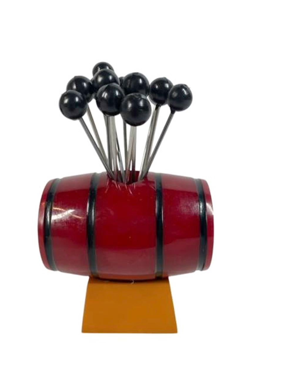 Art Deco Cocktail Picks, 12 Picks in a Red Bakelite Keg-Form Holder In Good Condition For Sale In Nantucket, MA