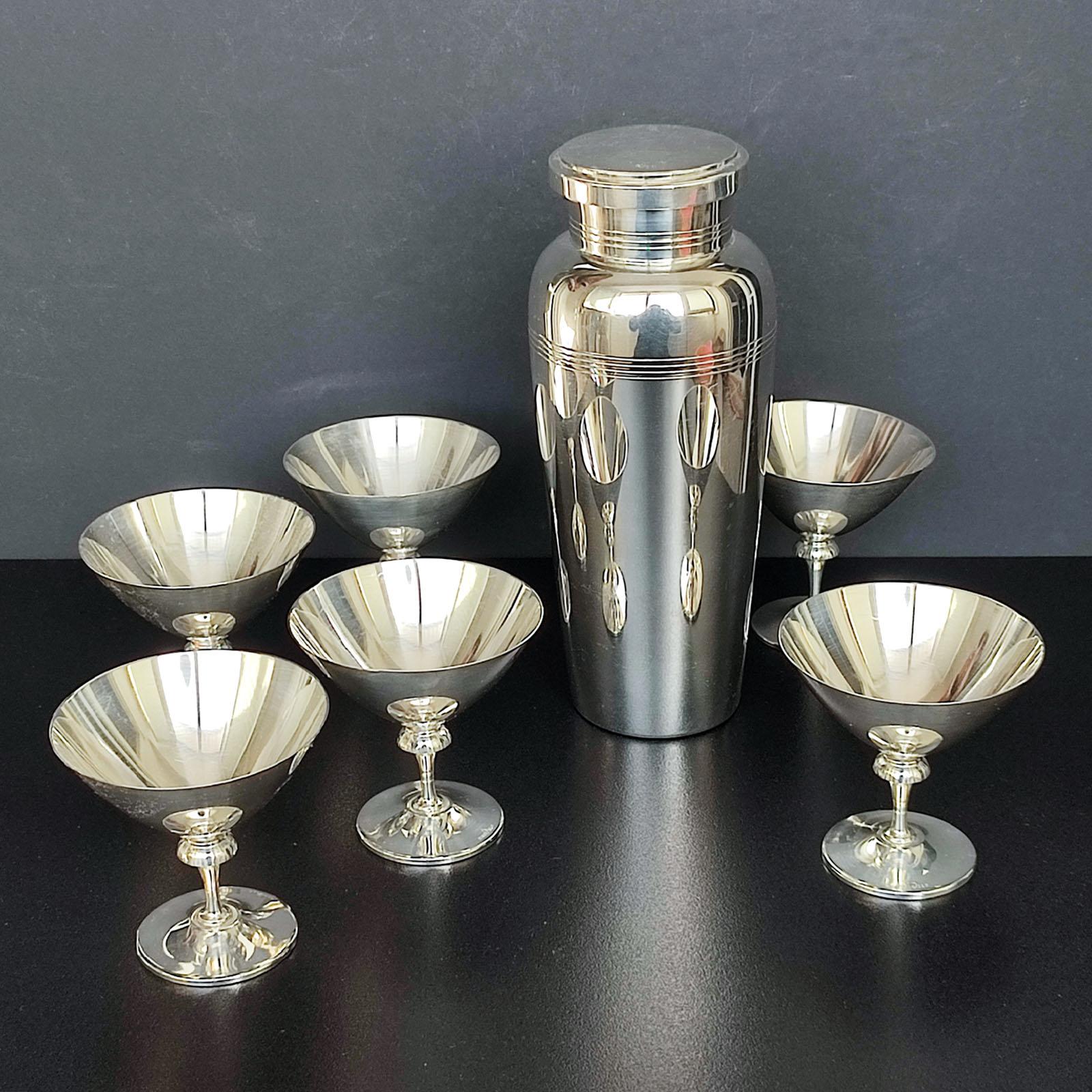 Art Deco Cocktail Shaker, CG Hallberg and Six Glasses, Folke Arström, GAB, Sweden
Wonderful, silver-plated Art Deco cocktail shaker and six martini glasses. Each piece stamped. In excellent condition according to their age, these items are a great