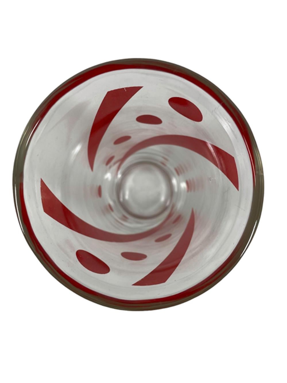 Clear glass Art Deco cocktail shaker of tapered form with alternating red enamel bands and graduated dots with a chrome lid of domed form with stepped rings and an integral pour-spout with strainer.