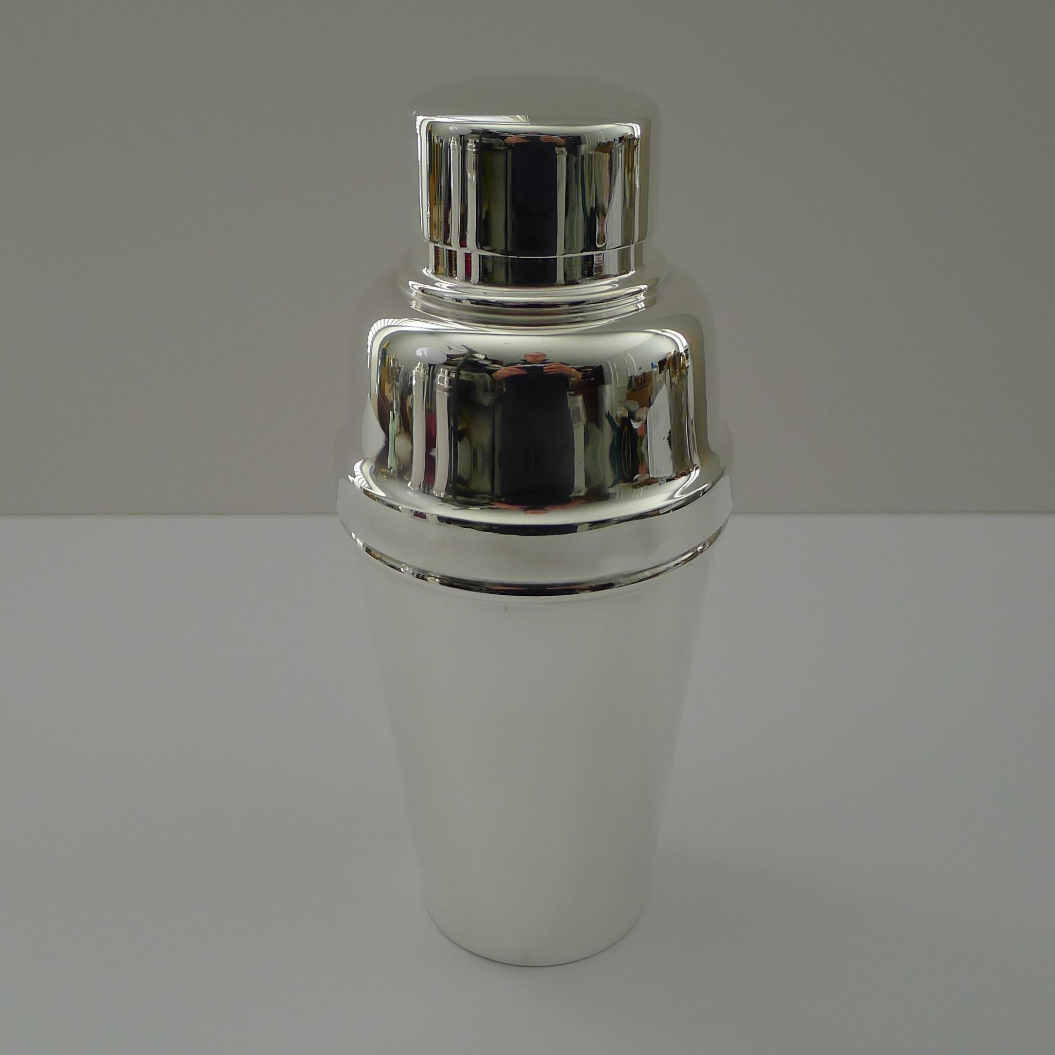 A lovely cocktail shaker by the top-notch London silversmiths, 
