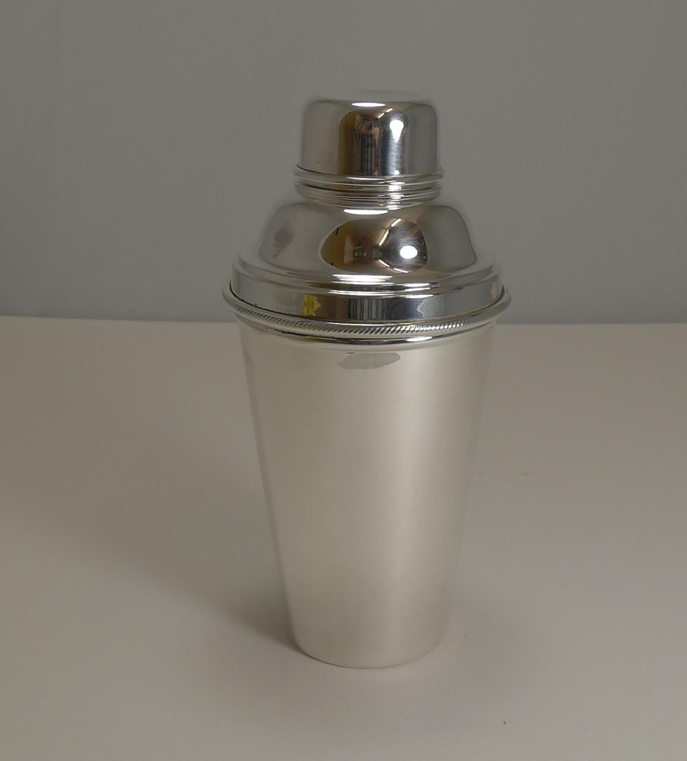 A lovely cocktail shaker by the top-notch London silversmiths, 