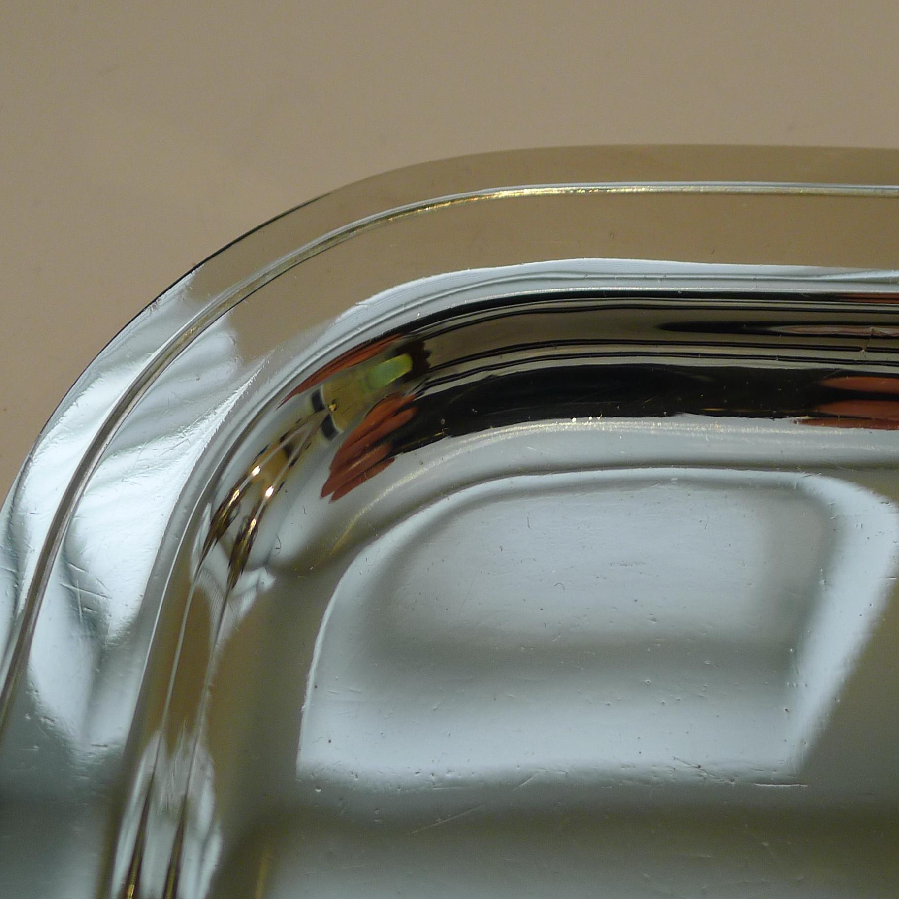 A truly elegant rectangular silver plated cocktail tray in silver plate, fully marked on the underside for this top-notch Parisian silversmith.

Just back from our silversmith, this tray has been professionally cleaned and polished, restoring it to