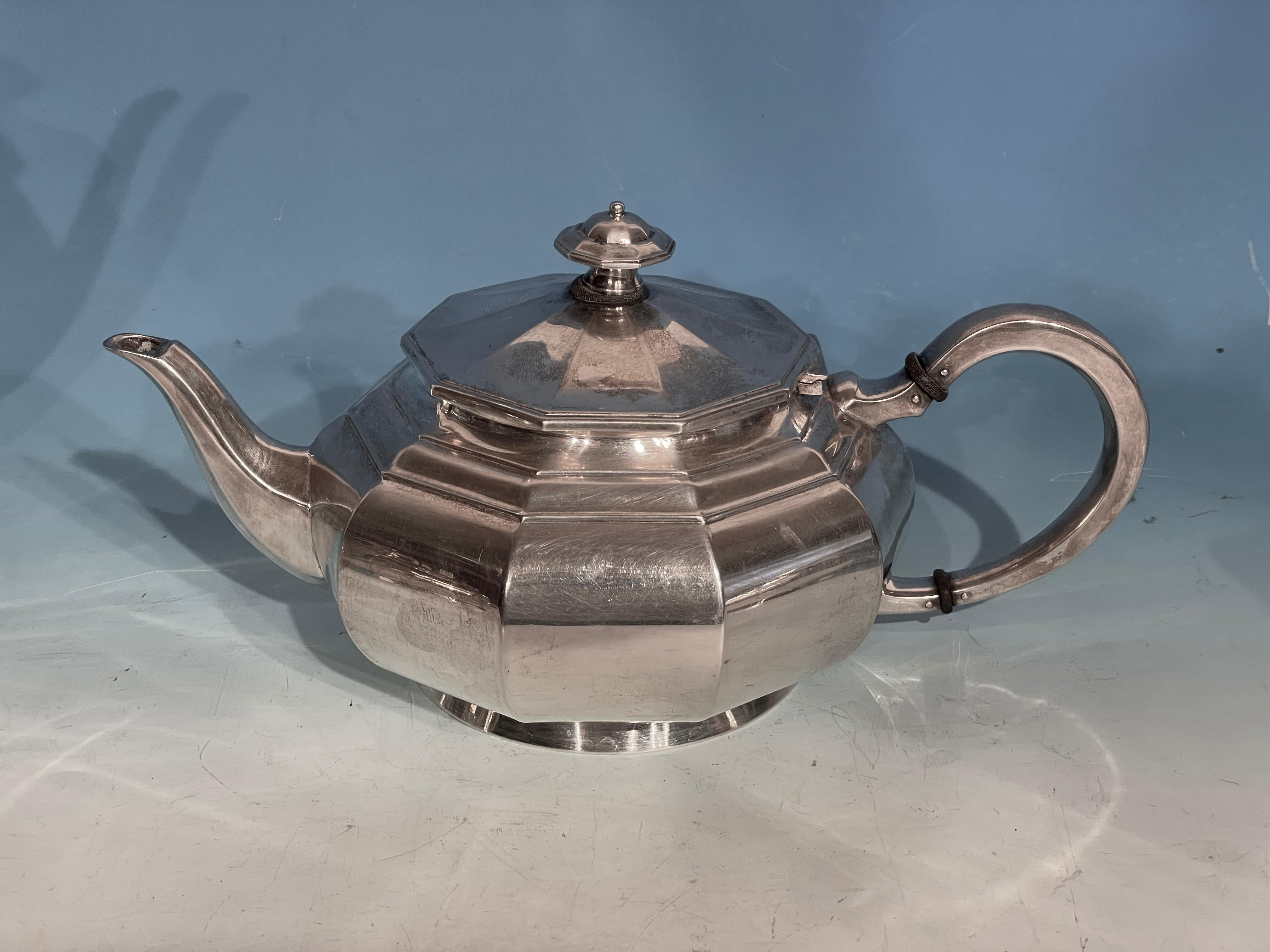 Coffee and tea set silver, Germany 1900-20. 
This pretty coffee and tea set stands out for its geometric design of the early 20th century. The silver marks identify it as a German piece with a millesimal fineness of 835. 
Size of the tea pot: H: