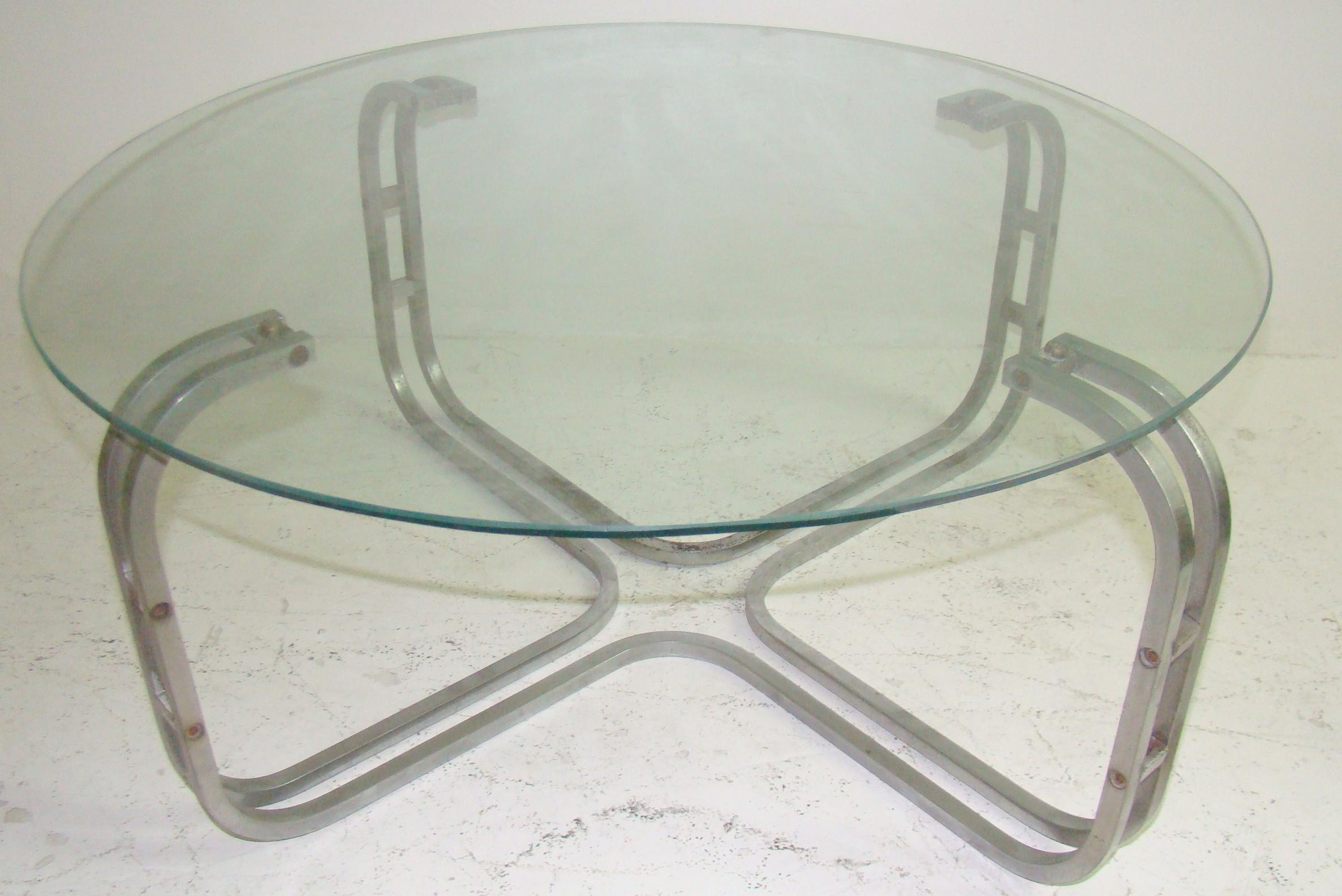 Coffe table

Material: Chrome and glass
Style: Art Deco
German.
We have specialized in the sale of Art Deco and Art Nouveau styles since 1982.If you have any questions we are at your disposal.
Pushing the button that reads 'View All From Seller'.
