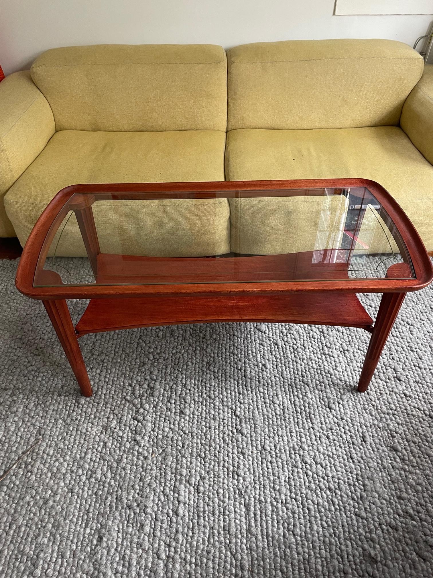 What a table! This iconic art-deco (style) table is a lust for the eye. A table you just want in your home, store, shop or office. 
In plain beautiful style and condition. Minor signs of usage, small scratches in the glass. Just beautiful patina.