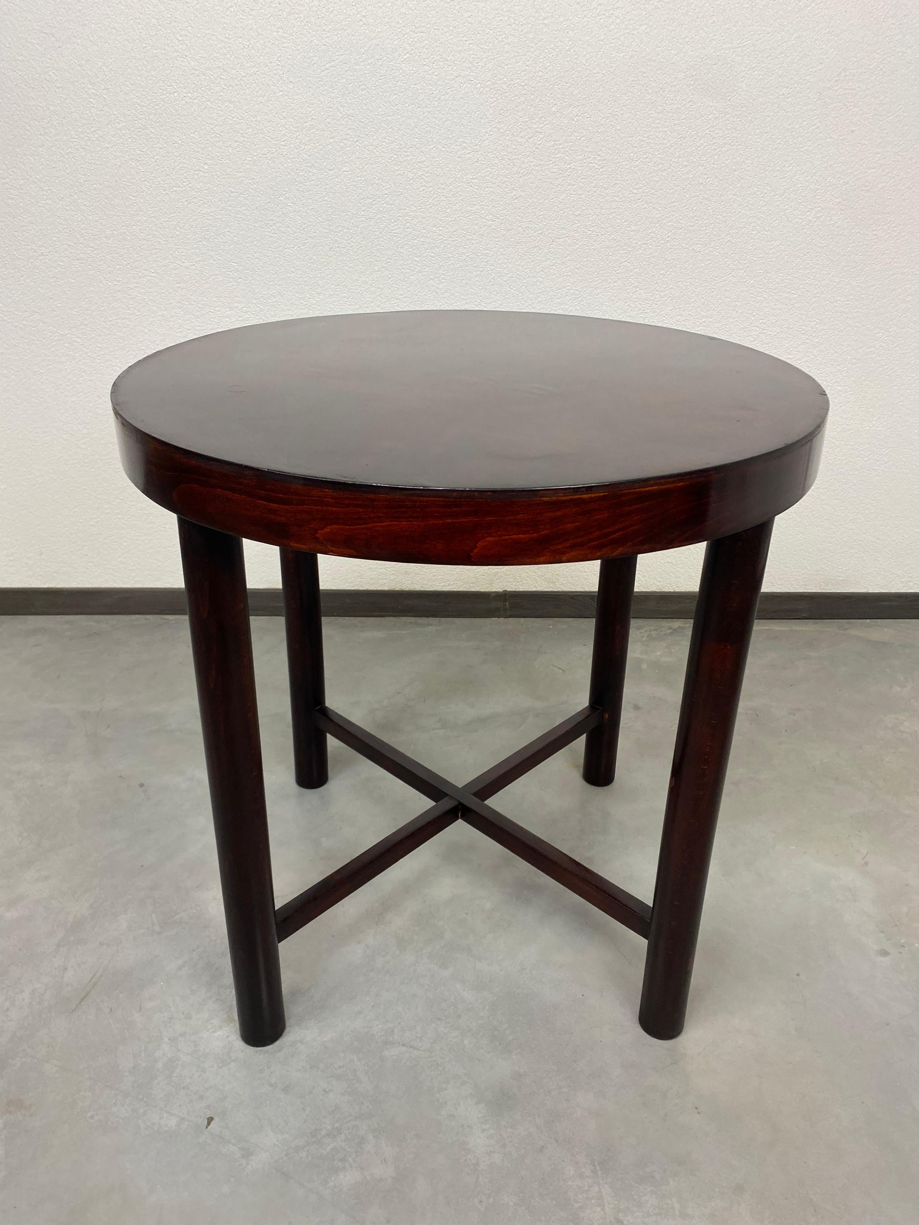 Round coffee table by Thonet Mundus circa 1930. Professionally stained and repolished.