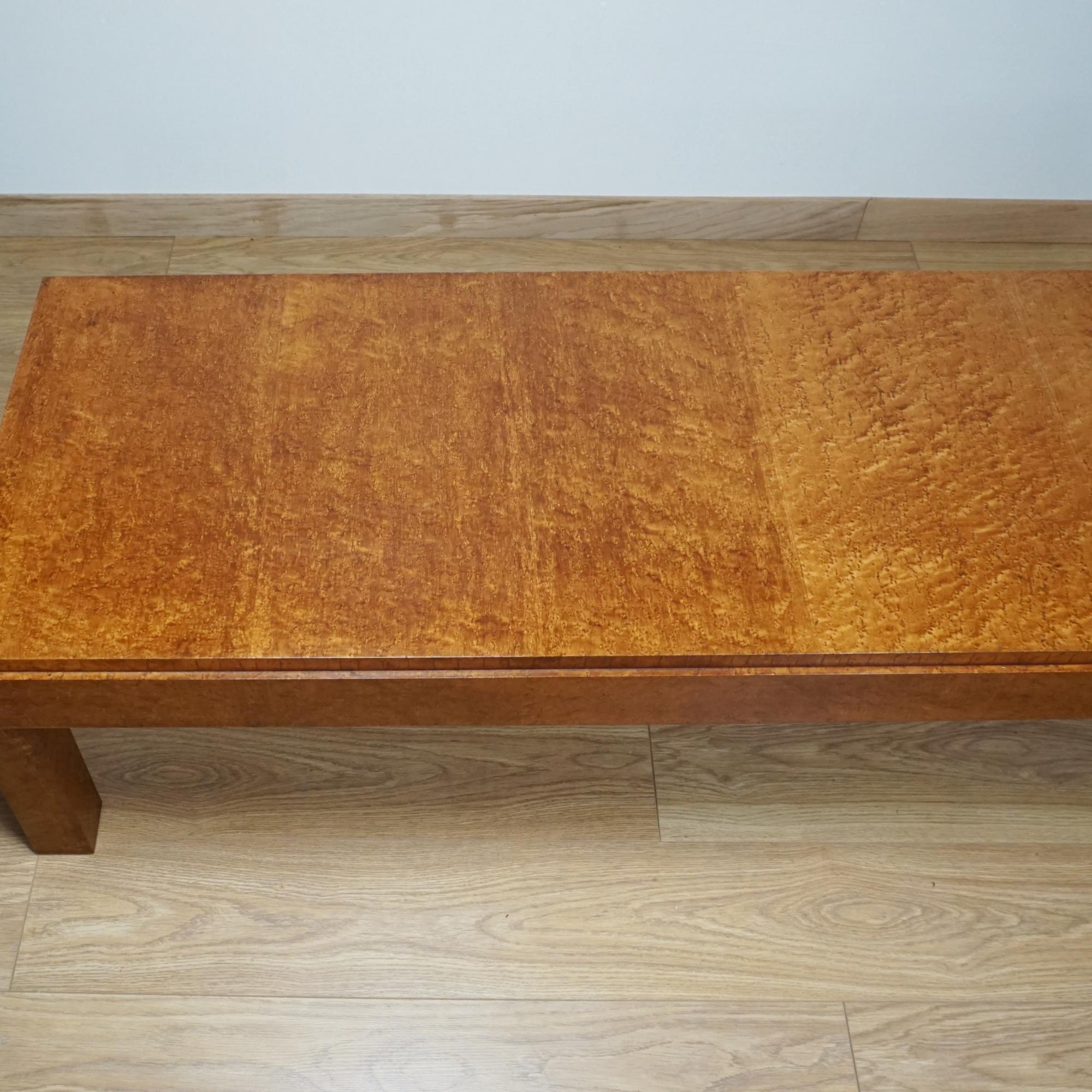 An Art Deco maple and lacewood coffee table by Waring & Gillow. Label to underneath. 

Dimensions: H 42cm W 150cm D 57.5cm

Origin: English

Date: Circa 1935

Item Number: 0506254

All of our furniture is extensively polished and restored where