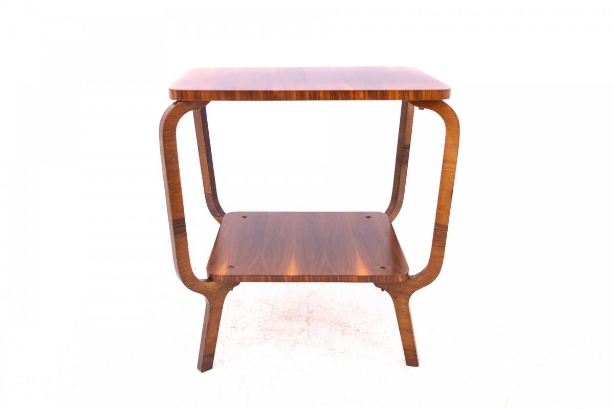 Art Deco coffee table from the mid-20th century. AFTER RENOVATION.

Very good condition, after professional renovation.

Wood: walnut

Dimensions: height 76 cm, width 73 cm, depth 50 cm