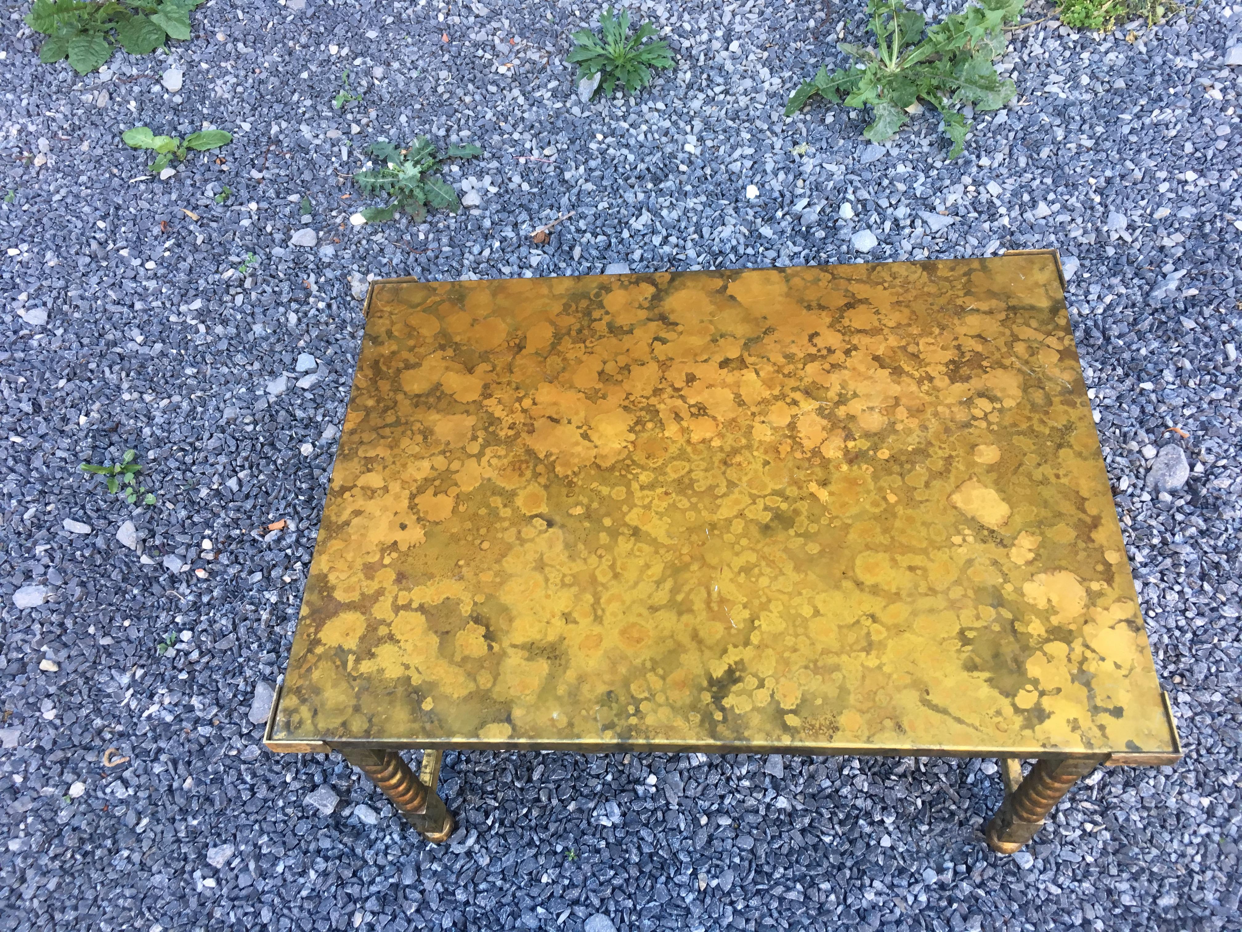 Art Deco coffee table oxidized brass, circa 1940.