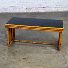 Mesa de centro Art Déco con estructura de ratán y tablero laminado negro, de Sons-Cunningham