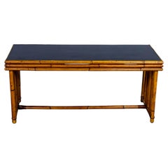 Mesa de centro Art Déco con estructura de ratán y tablero laminado negro, de Sons-Cunningham