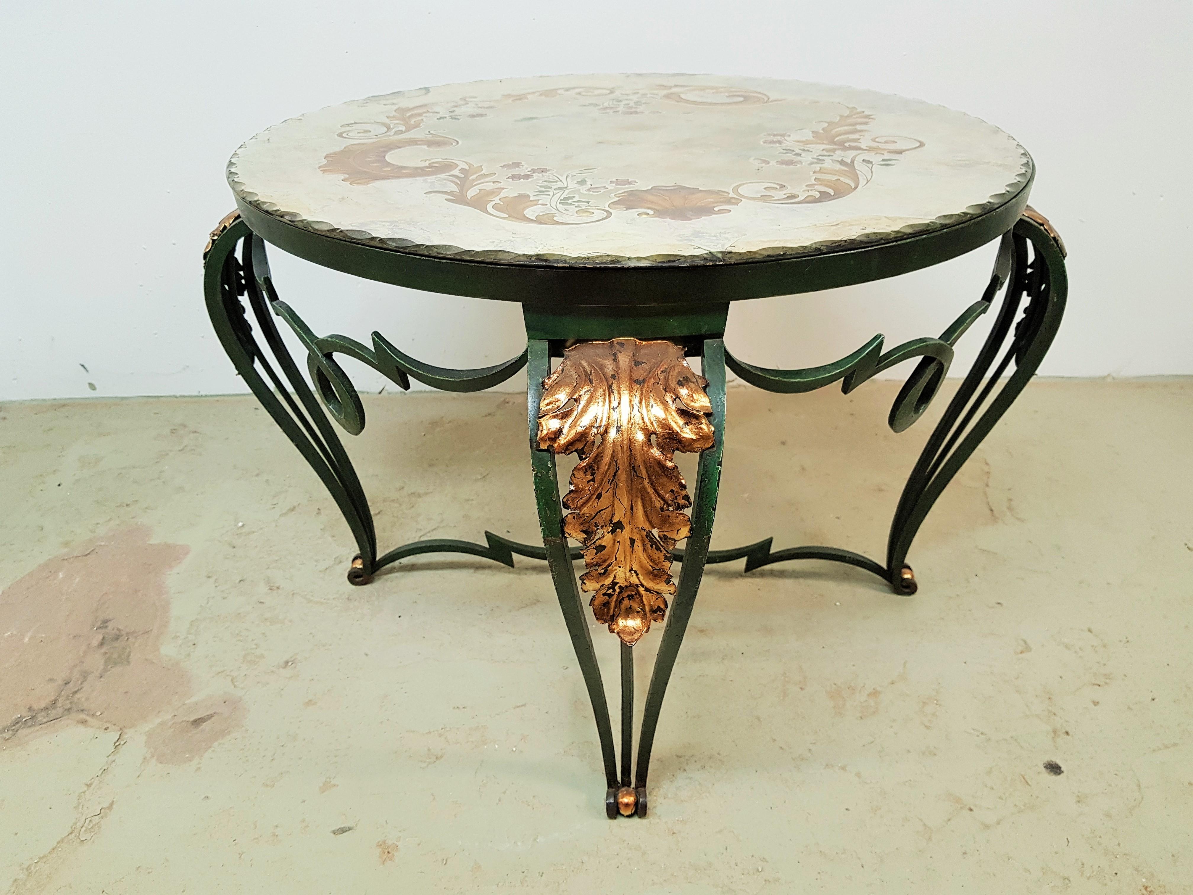 Wrought iron Art Deco table with églomisé Mirror by Rene Drouet, France, 1940. Dark green lacquer, gold leaf details. Mirror signed by artist.