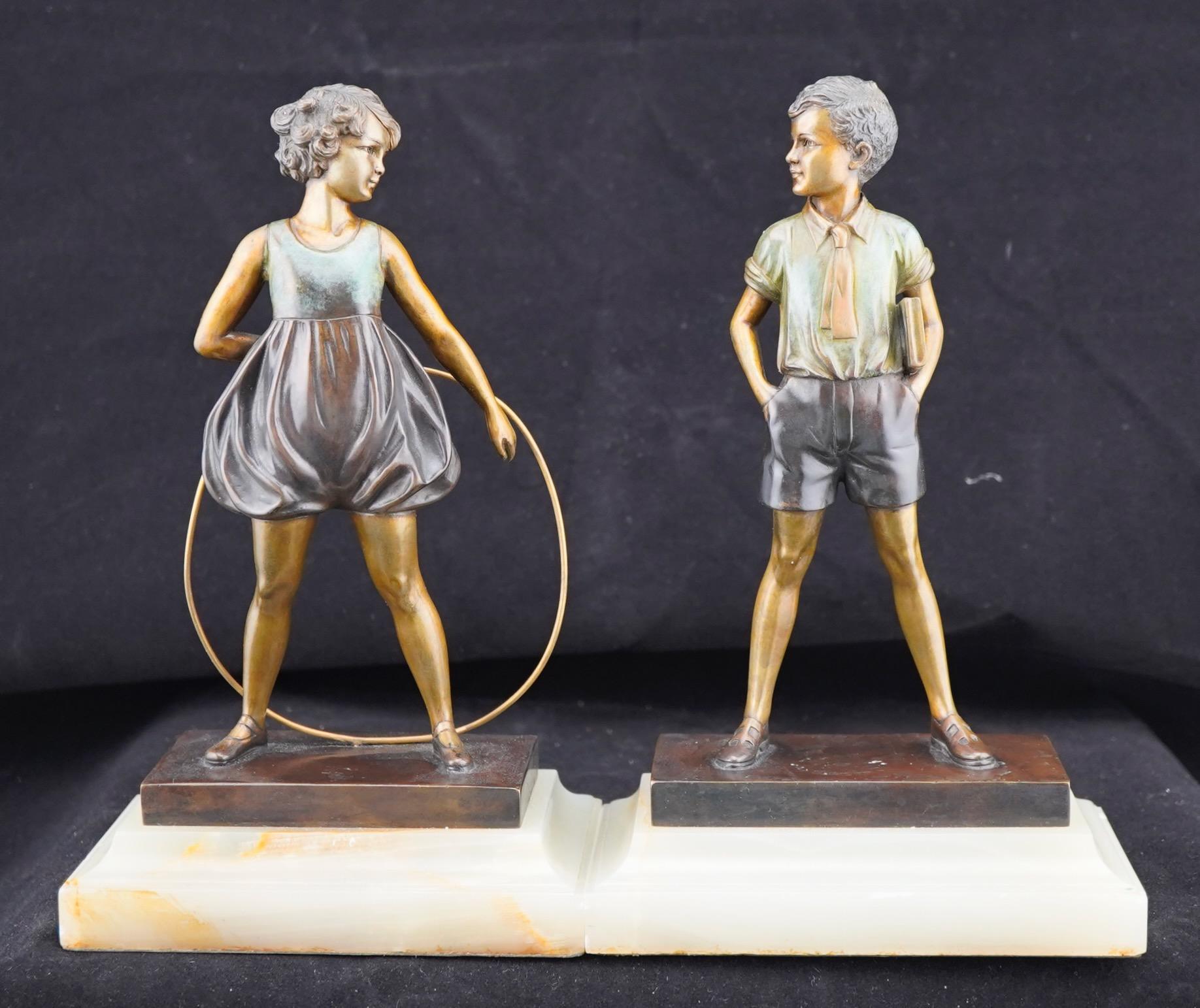 Art Deco cast and cold painted bronze pair by Ferdinand Preiss. The pair is known as 