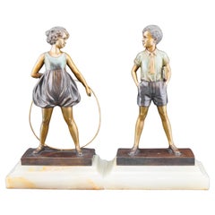 Coppia di bronzi dipinti a freddo Art Deco "Hoop Girl e Sonni Boy" di Ferdinand Preiss