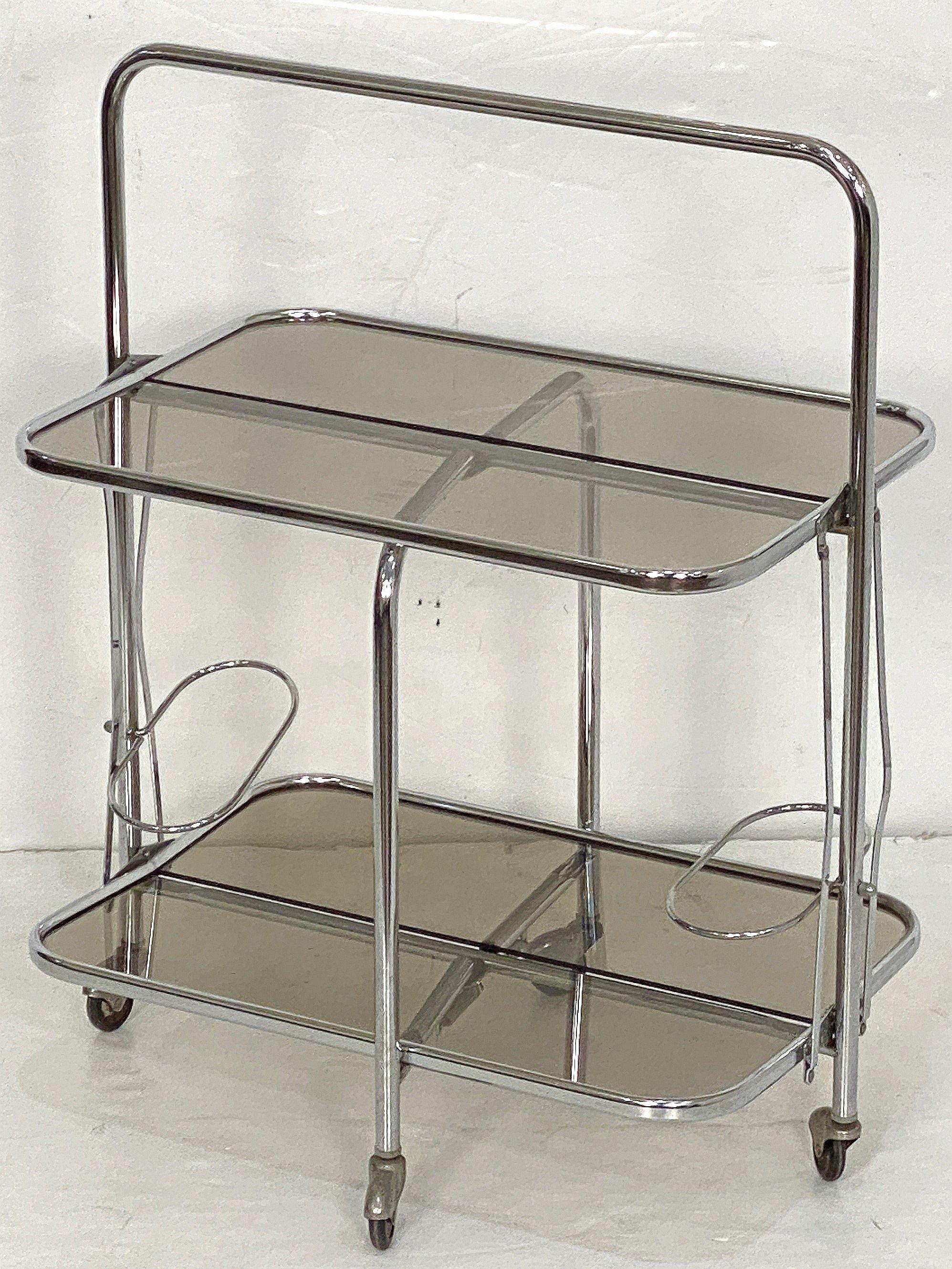 Mid-Century Modern Art Deco Collapsible Rolling Cart or Drinks Trolley of Chrome and Smoked Glass For Sale