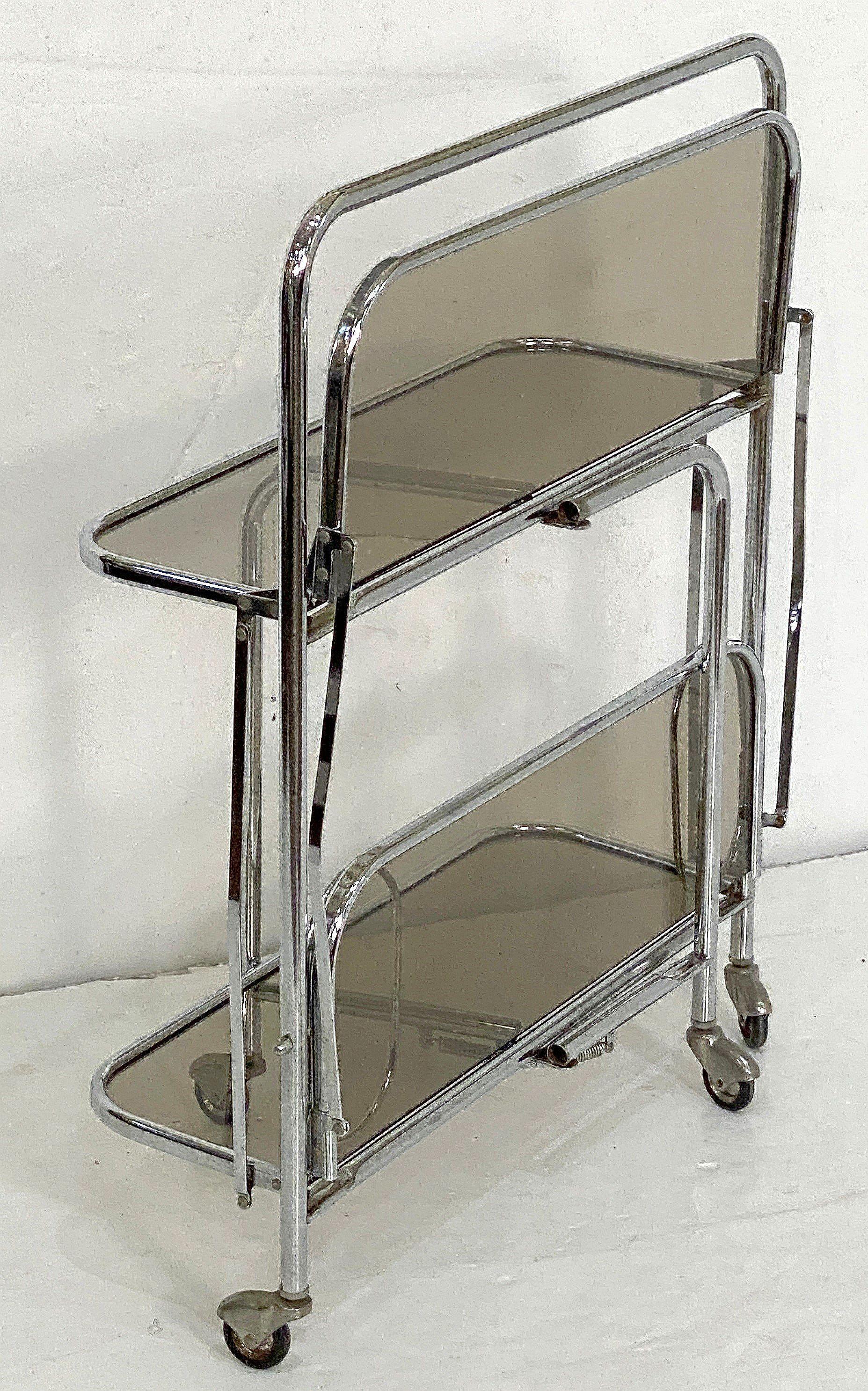 Metal Art Deco Collapsible Rolling Cart or Drinks Trolley of Chrome and Smoked Glass For Sale