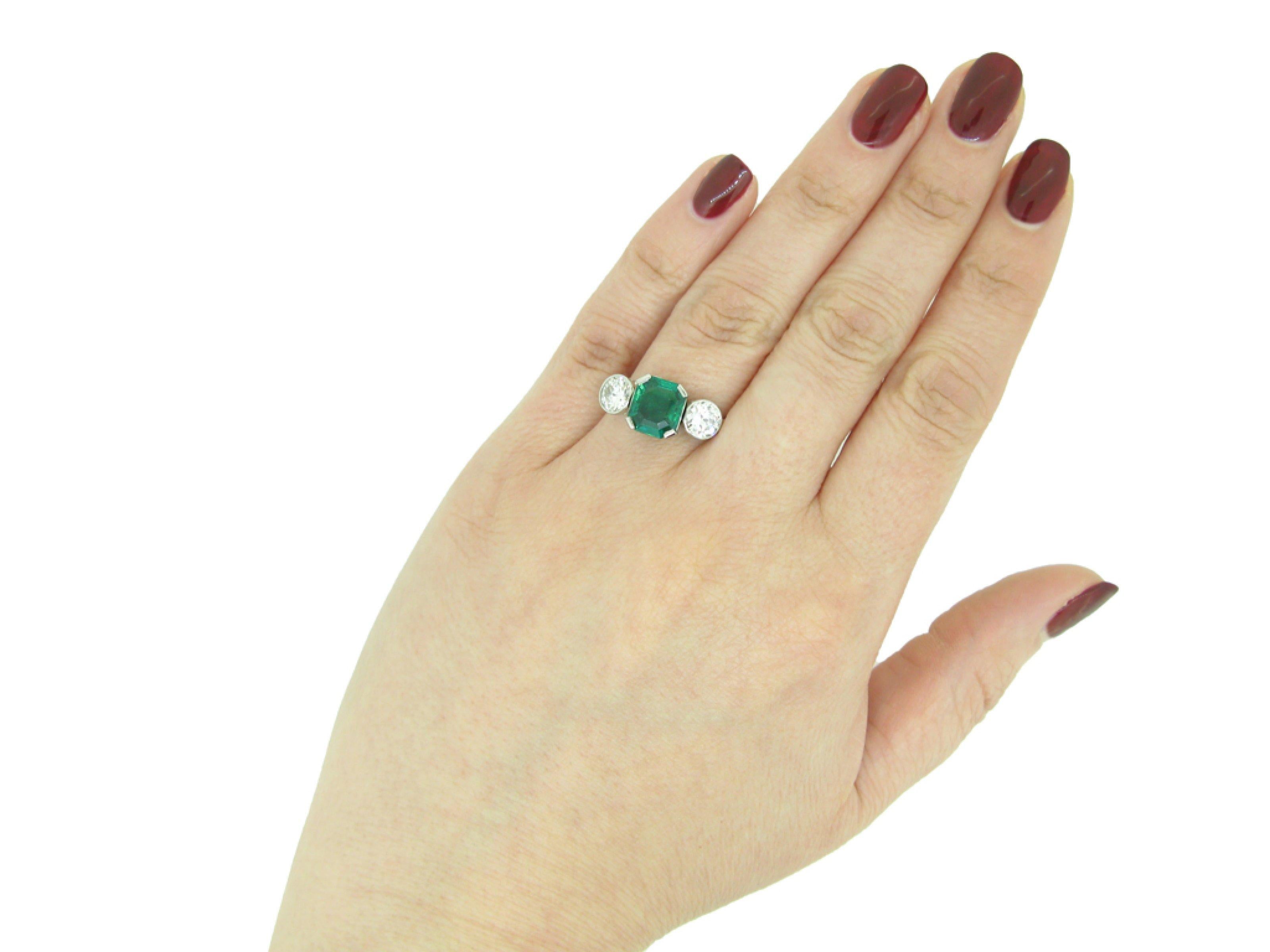 Emerald Cut Art Deco Colombian emerald and diamond ring, French, circa 1925 For Sale