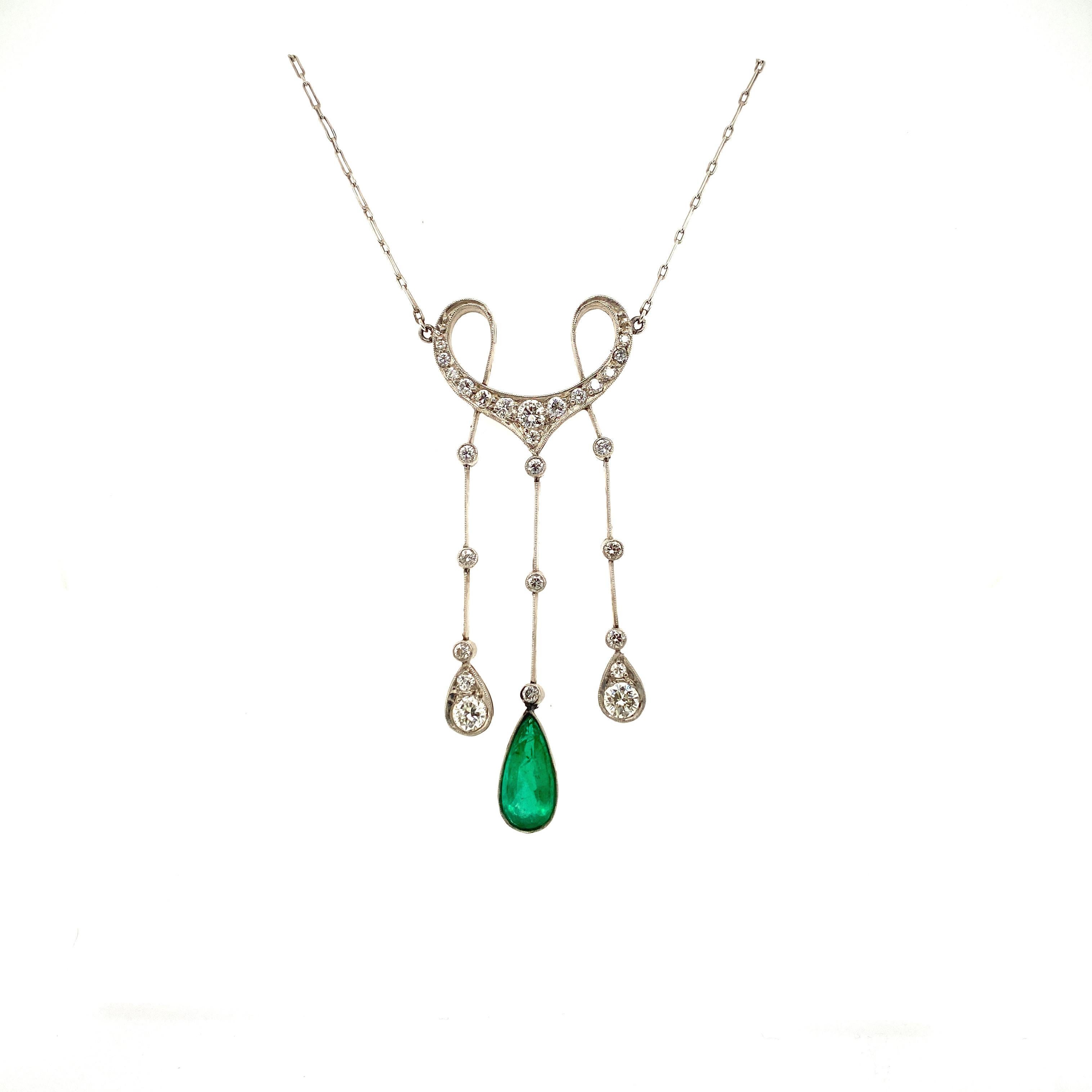 Art Deco Period emerald and diamond pendent on a platinum chain. The  center emerald weighs approximately 2.00cts and there are approximately 2.50cts in diamonds. Set in platinum on a platinum chain. The necklace measures 20