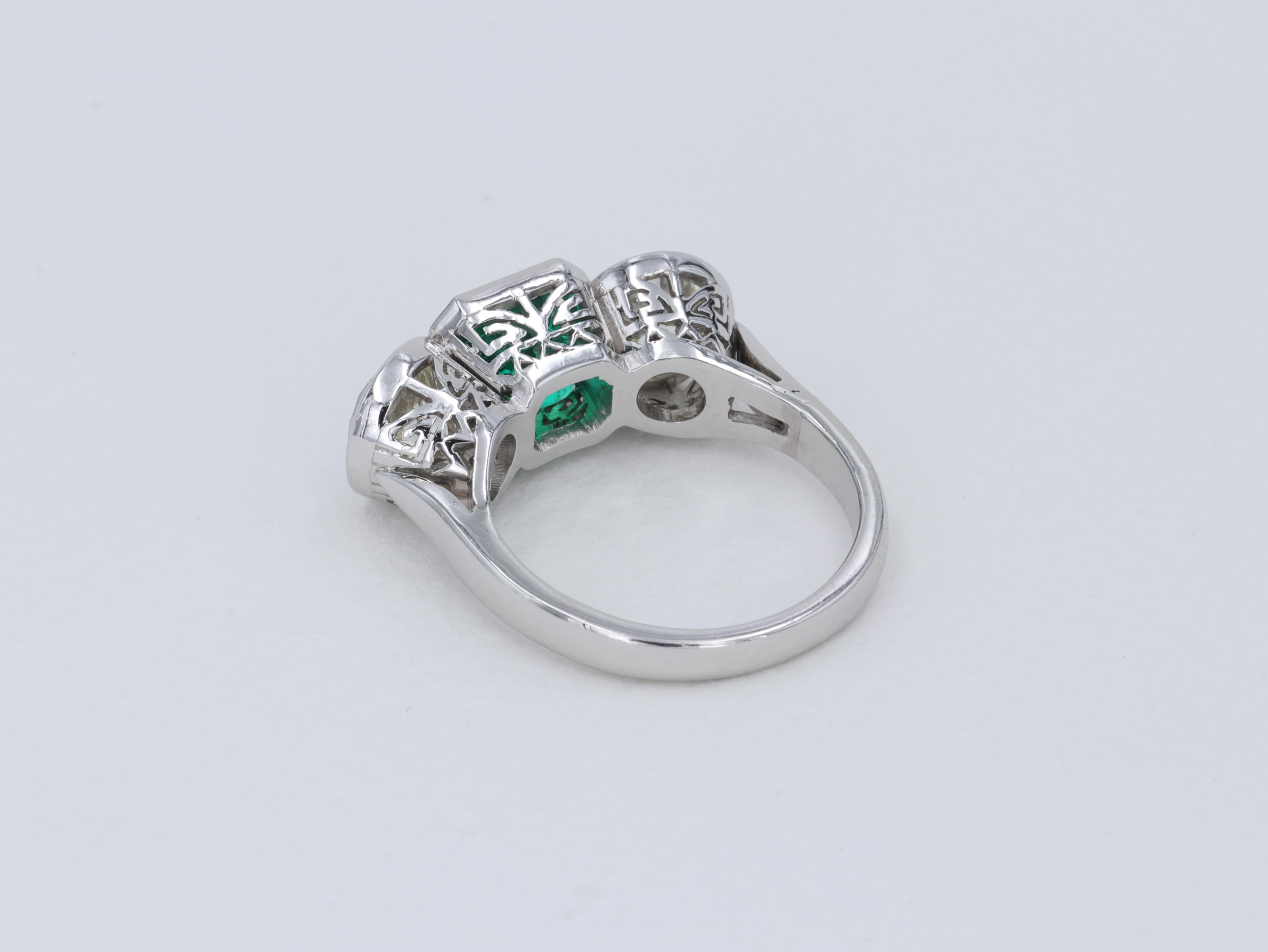 Art Deco Colombian Emerald and Old European Cut Diamond 3 Stone Ring in Platinum For Sale 1
