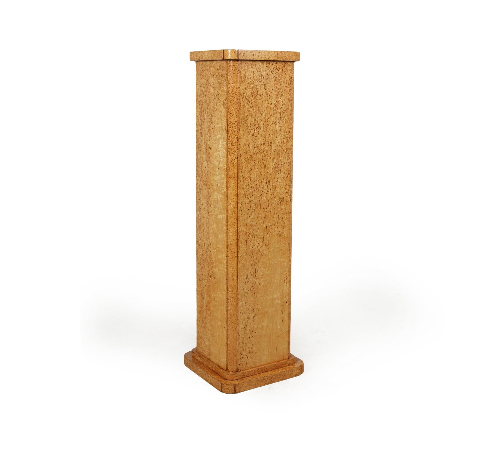 A fine quality Art Deco column or Bronze stand with stepped rounded corners and very highly figured karelian birch veneers, it is in excellent condition throughout having been correctly restored and fully polished by Hand

Age: 1925

Style: Art