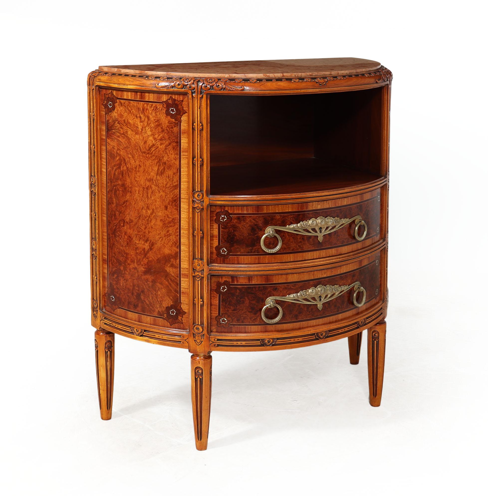 COMMODE BY MAJORELLE 
A stunning French Art Deco Commode from the 1920s by Majorelle! This exquisite piece features solid carved wood with intricate geometric and flower motifs, combined with elegant expensive veneers of walnut, maple, tulipwood and