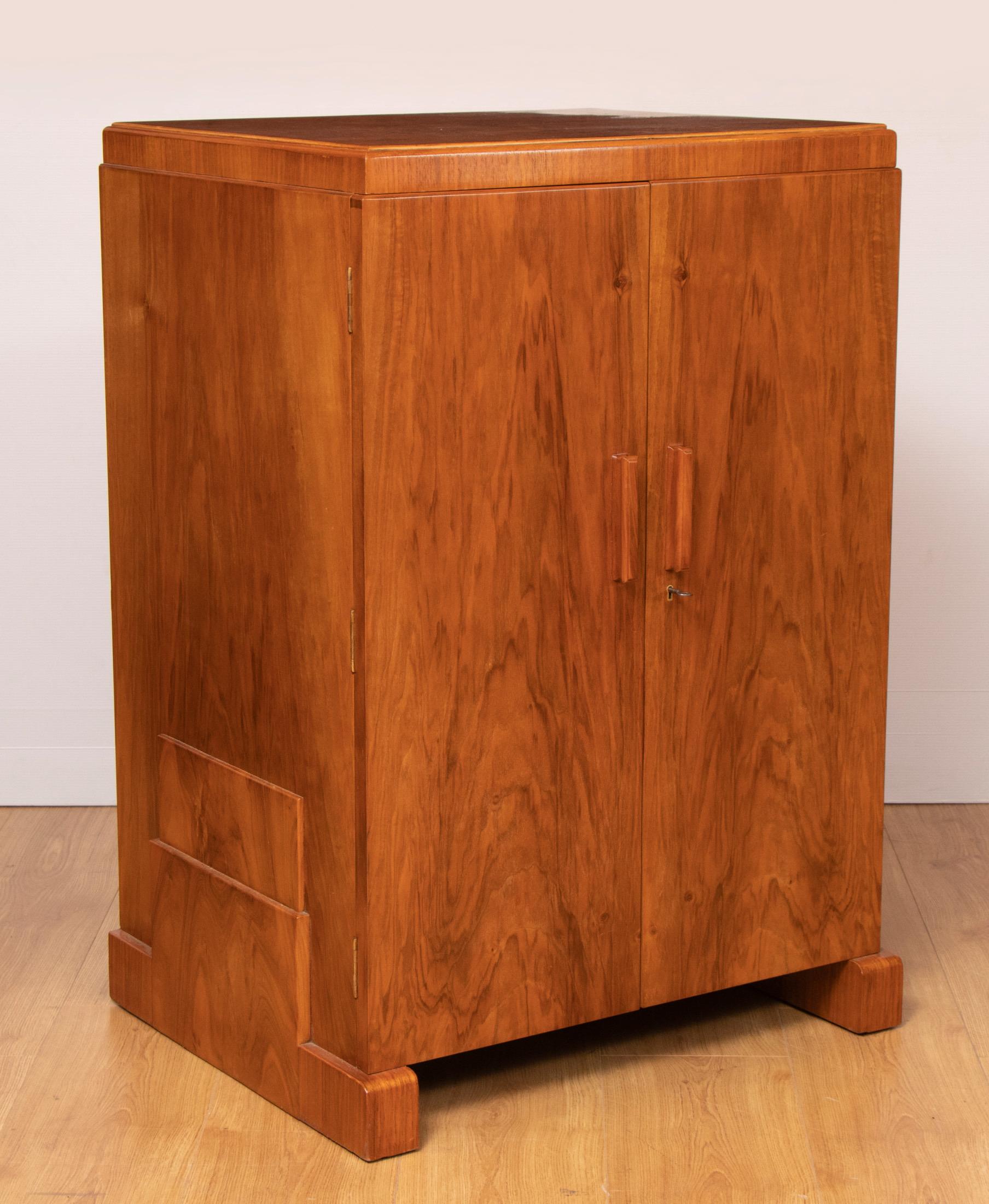 A beautiful walnut Art Deco cabinet containing three drawers of Mappin and Web Cutlery, the lower section for storage is fitted with single half shelf.
A very comprehensive range of cutlery with a table setting for twelve.
The cabinet is in a