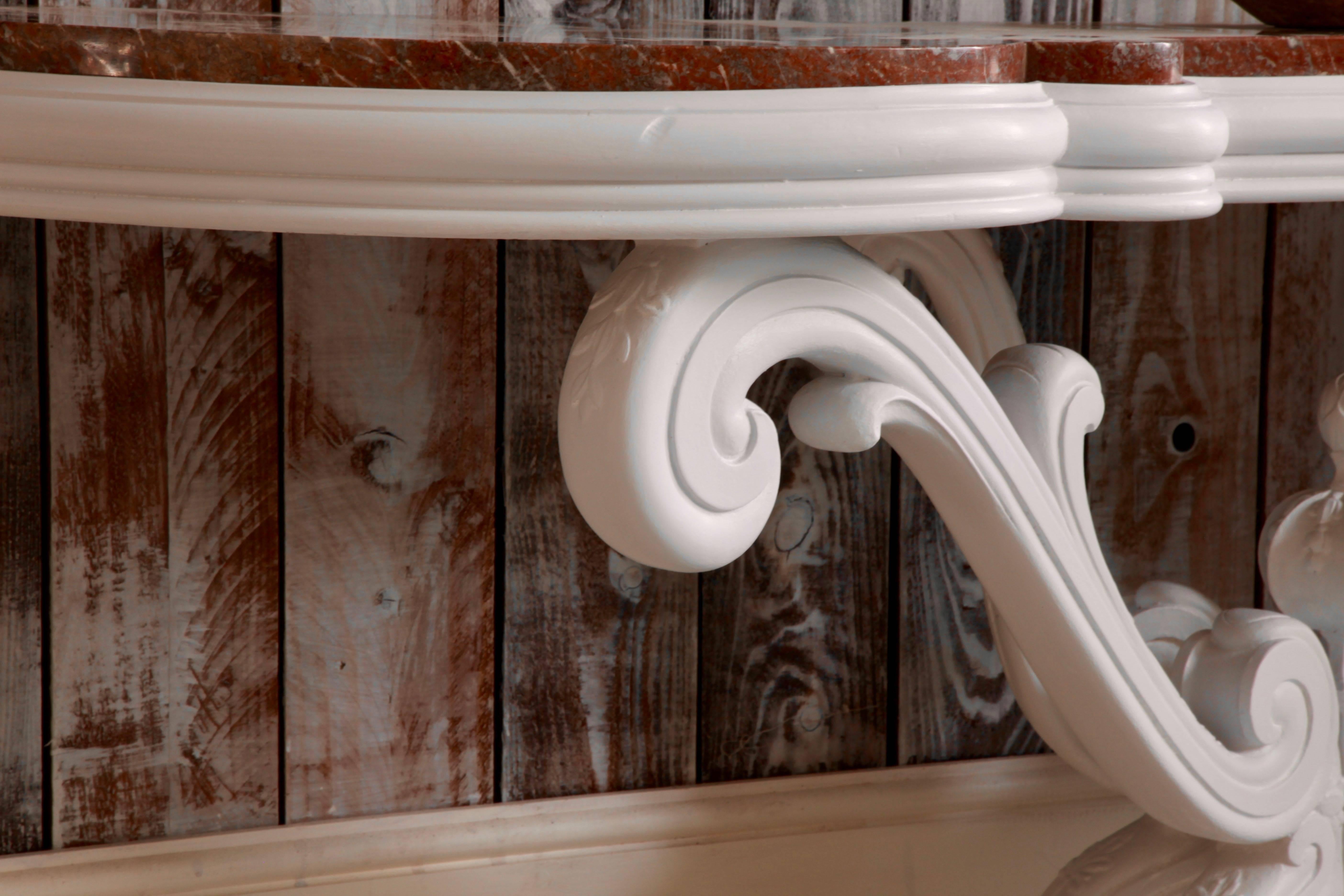Art Deco painted wooden console with a warm deep pyrenean marble top.
 