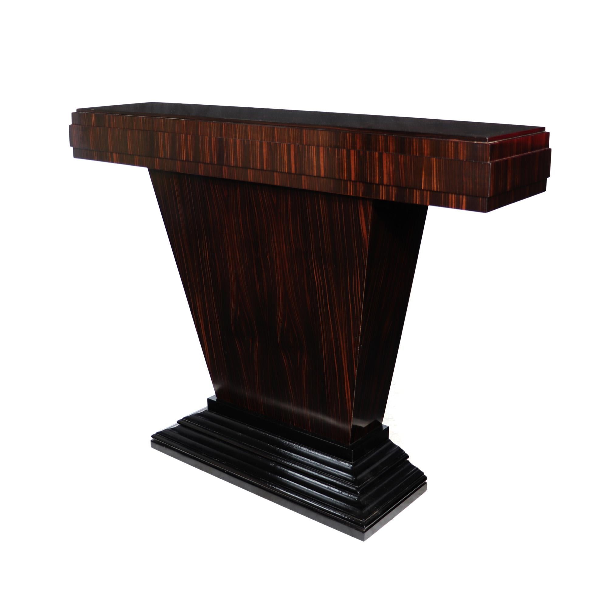 The classic French Art Deco styling of this console table combined with high quality materials and Macassar ebony veneers would fit into any interior, Designed by Thomas London and produced in England by skilled cabinetmakers using traditional