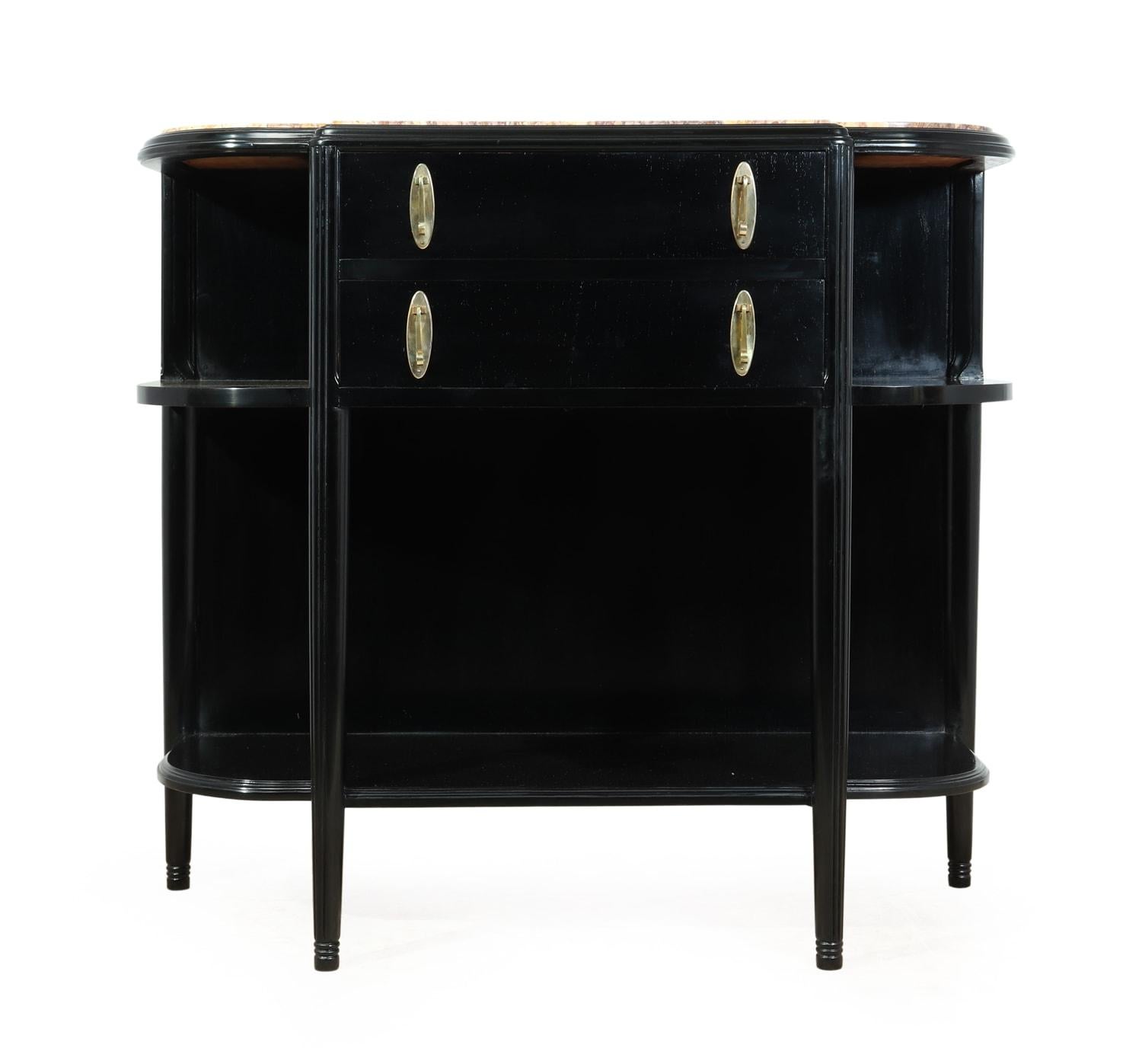Art Deco console table with marble top

This Art Deco console or hall table has two drawers with polished bronze handles, reeded legs and a marble top, the console table has been re polished to a black piano finish, the marble on top has had no