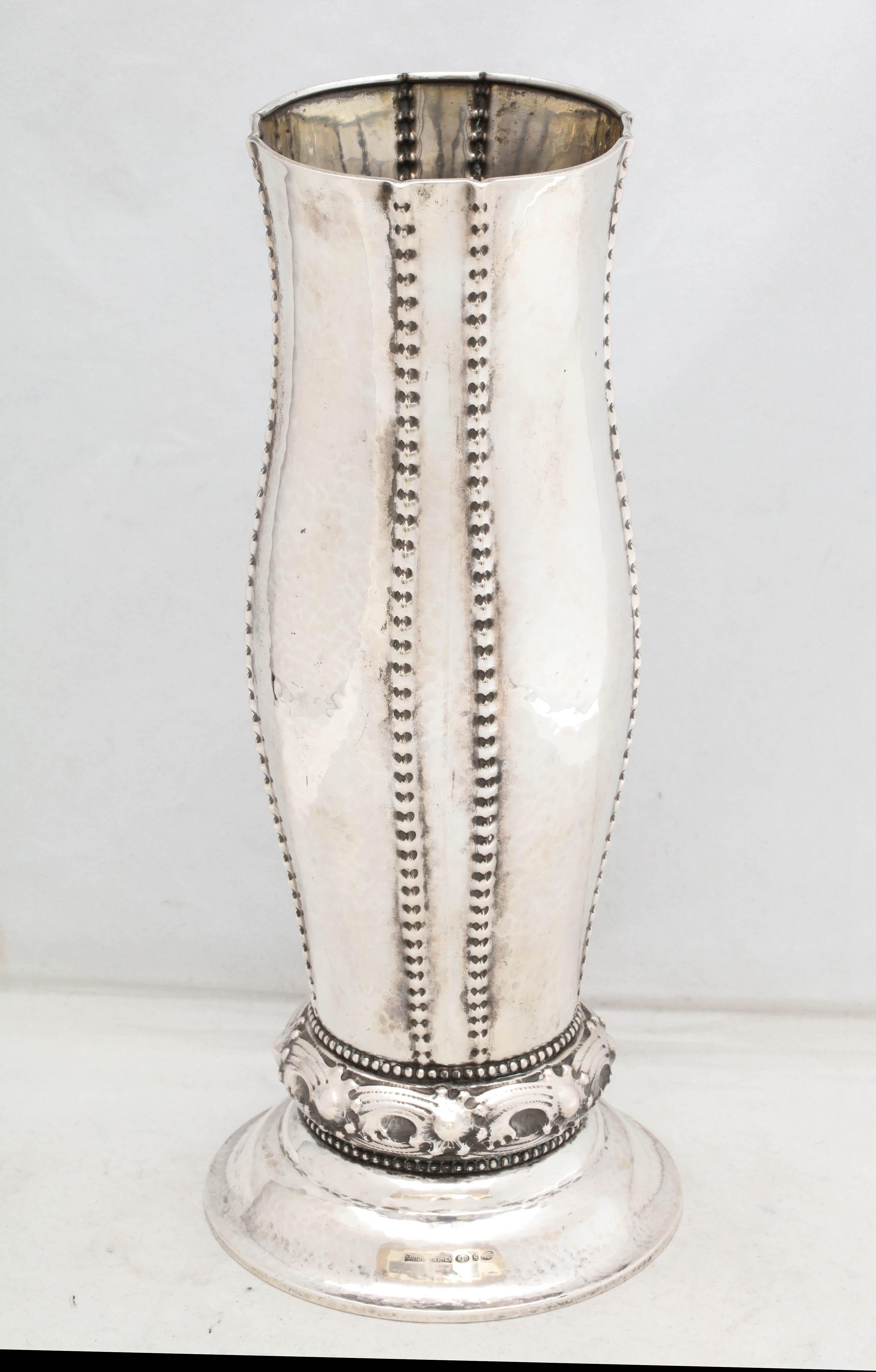 Art Deco, Continental silver (.830) vase, Norway, circa 1915, David Andersen - maker. Hammered silver is decorated with beaded design. Measures 11 1/4 inches high x 5 inches diameter across base (widest point) x 3 1/2 diameter across opening. Weighs