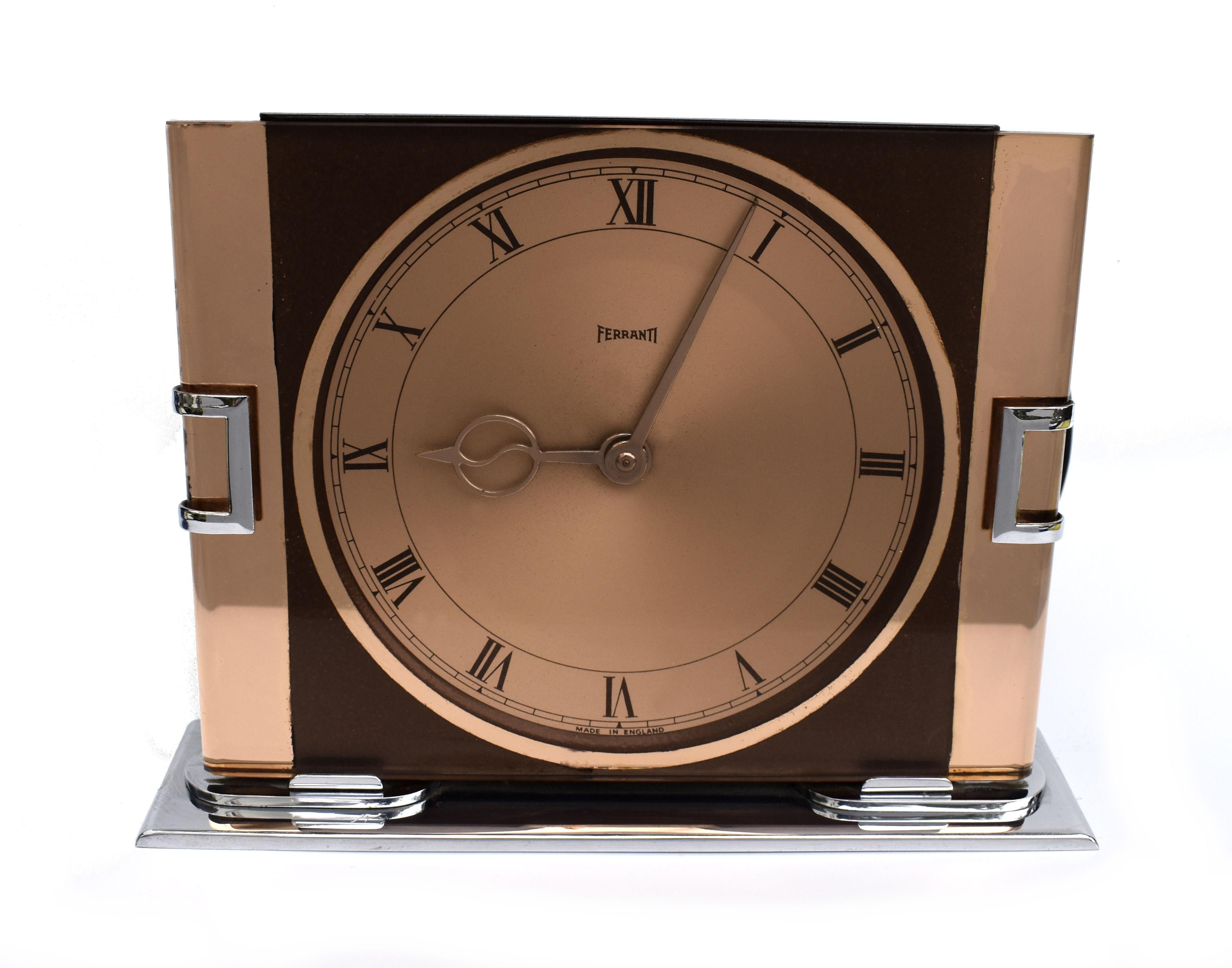 For your consideration is this copper coloured glass, and chrome frame Art Deco clock. Remarkable condition for it's age is this totally authentic 1930s Art Deco style mirror clock which originates from England. Made by Ferranti, an amazing company