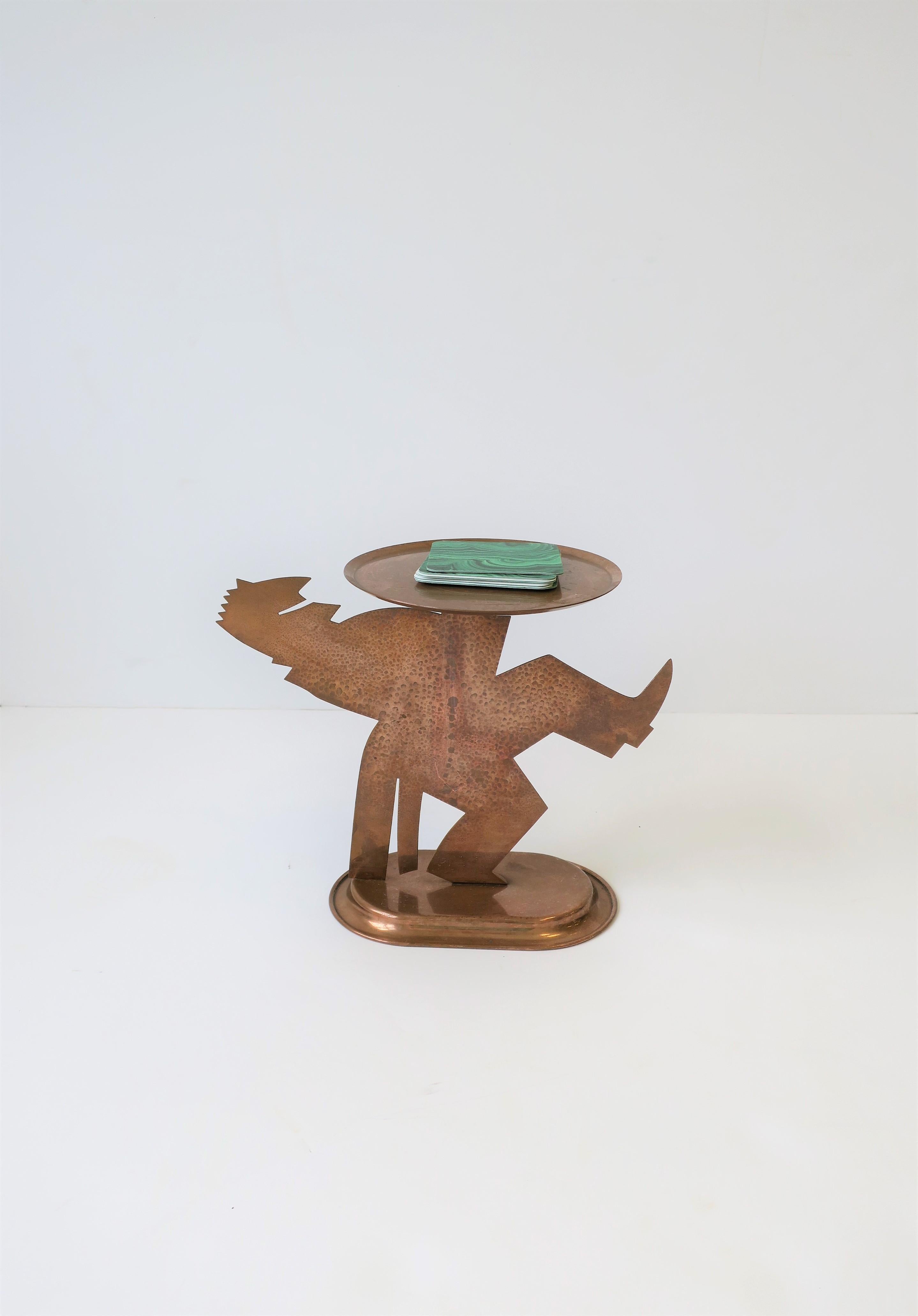 A beautiful rare American Art Deco period copper figurative sculpture piece by the Chase Brass and Copper Company Inc., circa early 20th century, USA. This copper sculpture is of a 'waiter in coattails' holding a tray and smiling. A very cool