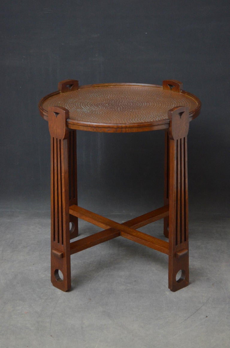 Sn4936 stylish Art Deco table in oak, having decorative hammered copper top raised on four solid oak uprights united by cross stretcher. This occasional table is in excellent original condition ready to place at home, circa 1940. Measures: Height